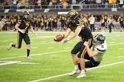 New London-Spicer’s Grant Paffrath (12) pitched the ball to teammate Brycen Christensen for the winning touchdown in the Class 3A Prep Bowl final.