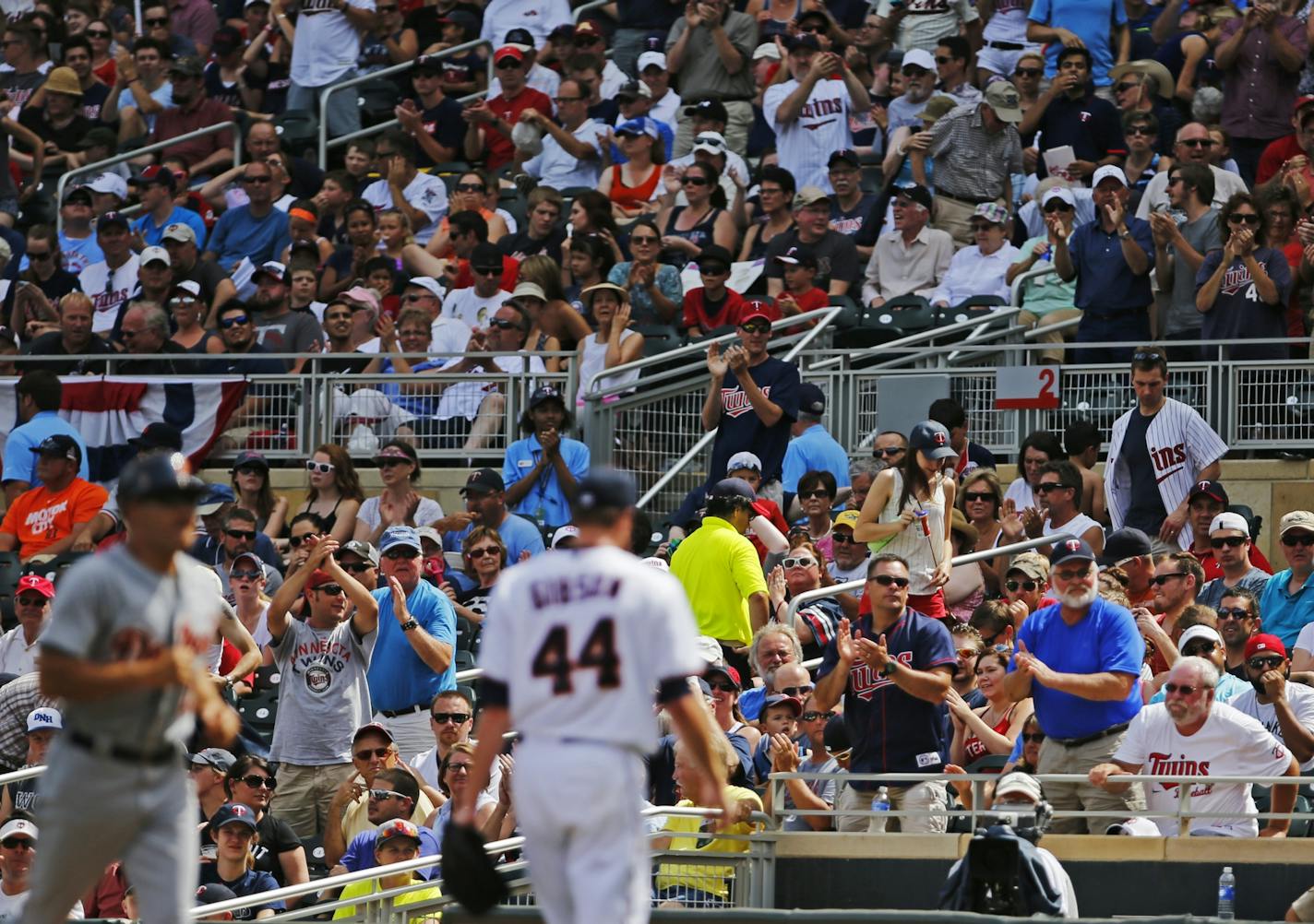 Starting pitcher Kyle Gibson went to the dugout after the 7th to applause from the fans.