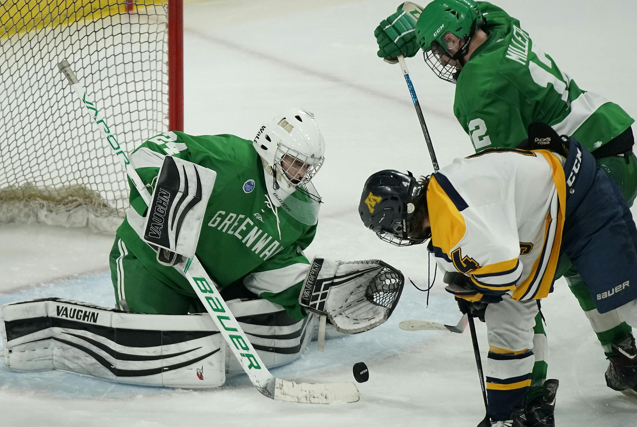 Greenway/Nashwauk-Keewatin goaltender Logan Wright (24) defends the goal as Mahtomedi forward Colin Hagstrom (4) tries to score and Greenway/Nashwauk-Keewatin defenseman Christian Miller (12) defends during the third period. ] LEILA NAVIDI &#xa5; leila.navidi@startribune.com BACKGROUND INFORMATION: Mahtomedi plays against Greenway/Nashwauk-Keewatin in a Class 1A boys' hockey semifinal game at the Xcel Energy Center in St. Paul on Friday, March 8, 2019. Greenway/Nashwauk-Keewatin won the game in