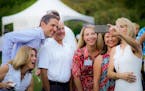 Steve Schneider and Maggie Kirchoff, center, were among the guests at Taste and Toast 2016 at the Minnesota Landscape Arboretum.
