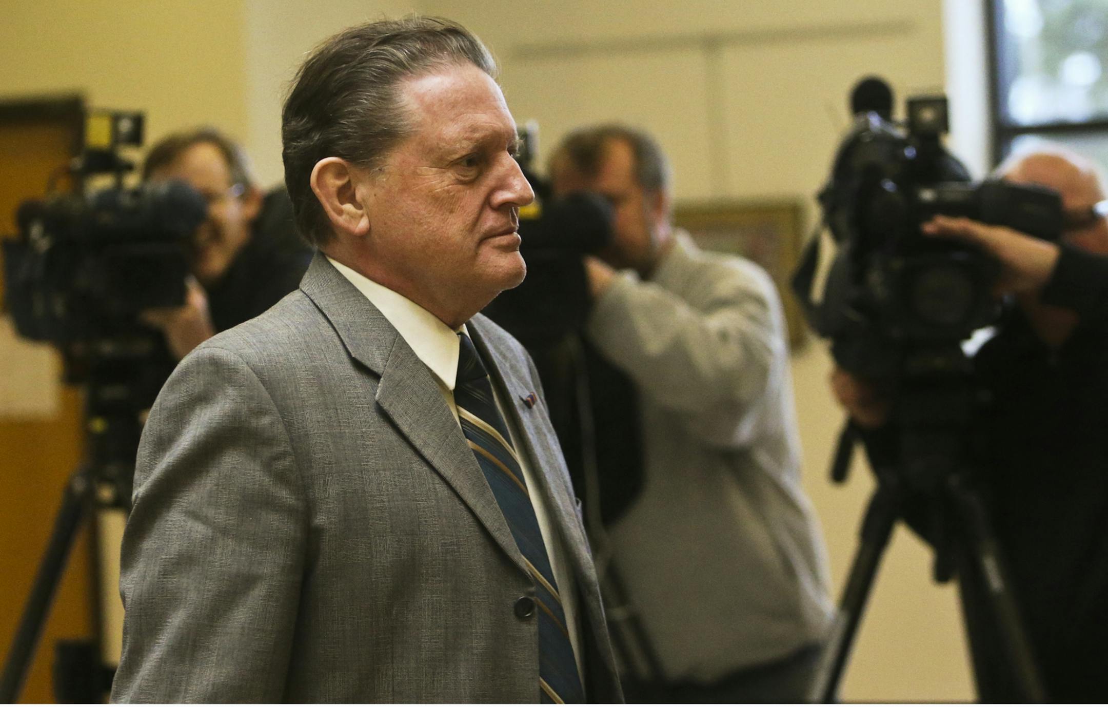 Byron Smith enters court before hearing the jury's verdict: guilty on all four counts in the murders of 17-year-old Nick Brady and 18-year-old Haile Kifer.