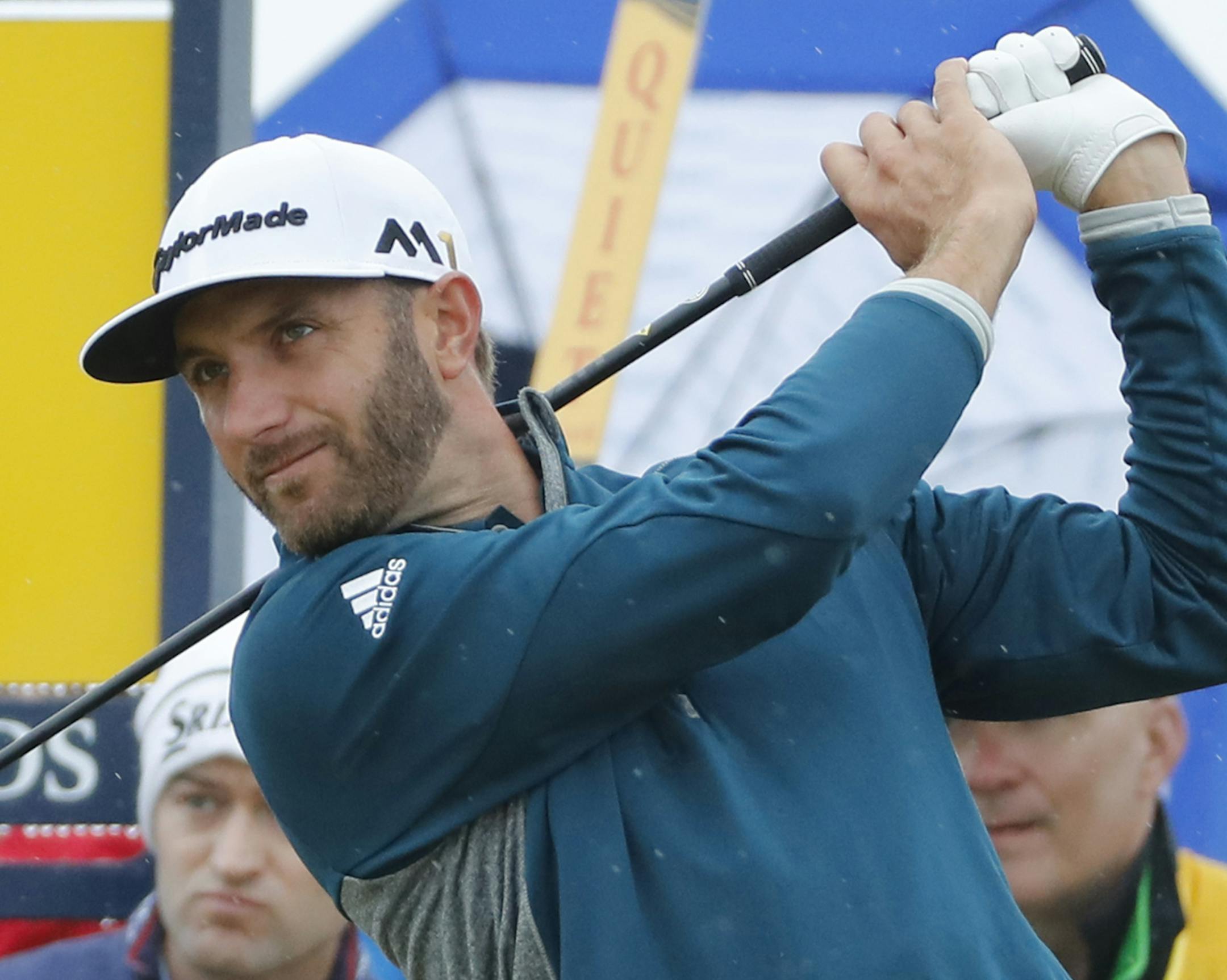 Dustin Johnson of the United States plays his tee shot from the 9th during the second round of the British Open Golf Championship at the Royal Troon Golf Club in Troon, Scotland, Friday, July 15, 2016. (AP Photo/Ben Curtis)
