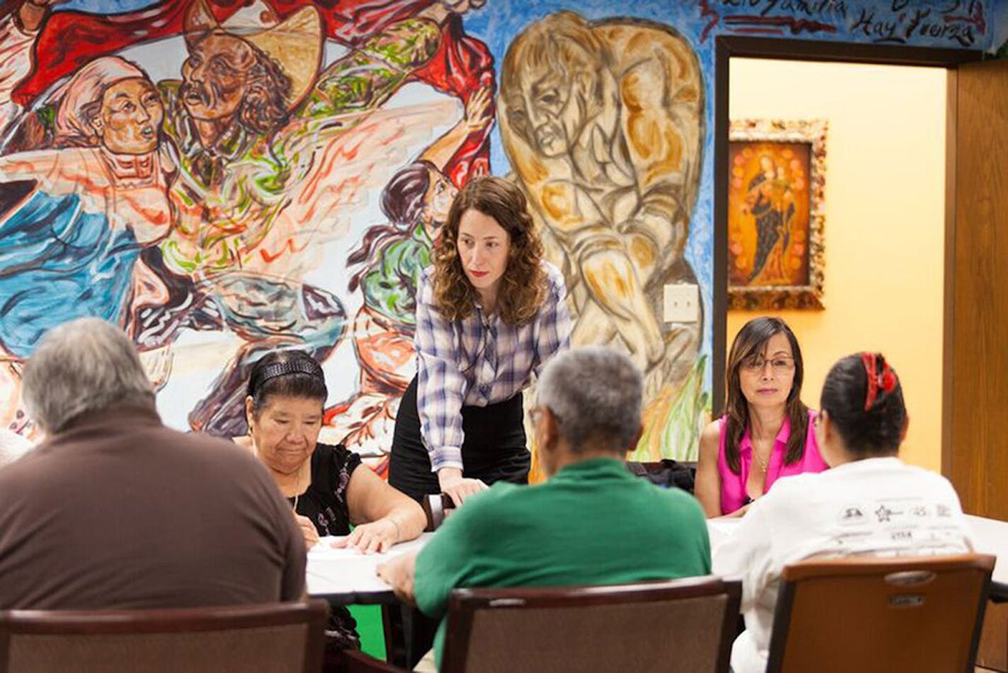 Aliza Nisenbaum teaches a portrait drawing class at Centro Tyrone Guzman.