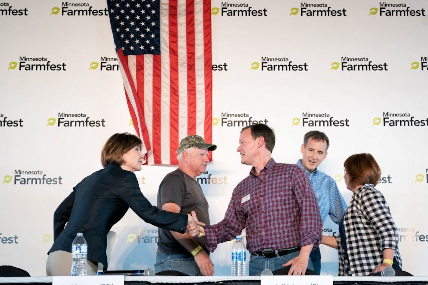 DFL and GOP candidates shook hands at the end of the forum. All five leading candidates for governor - Republicans Tim Pawlenty and Jeff Johnson, and DFLers Erin Murphy, Lori Swanson and Tim Walz - shared a stage for a forum at the FarmFest ag expo Wednesday.