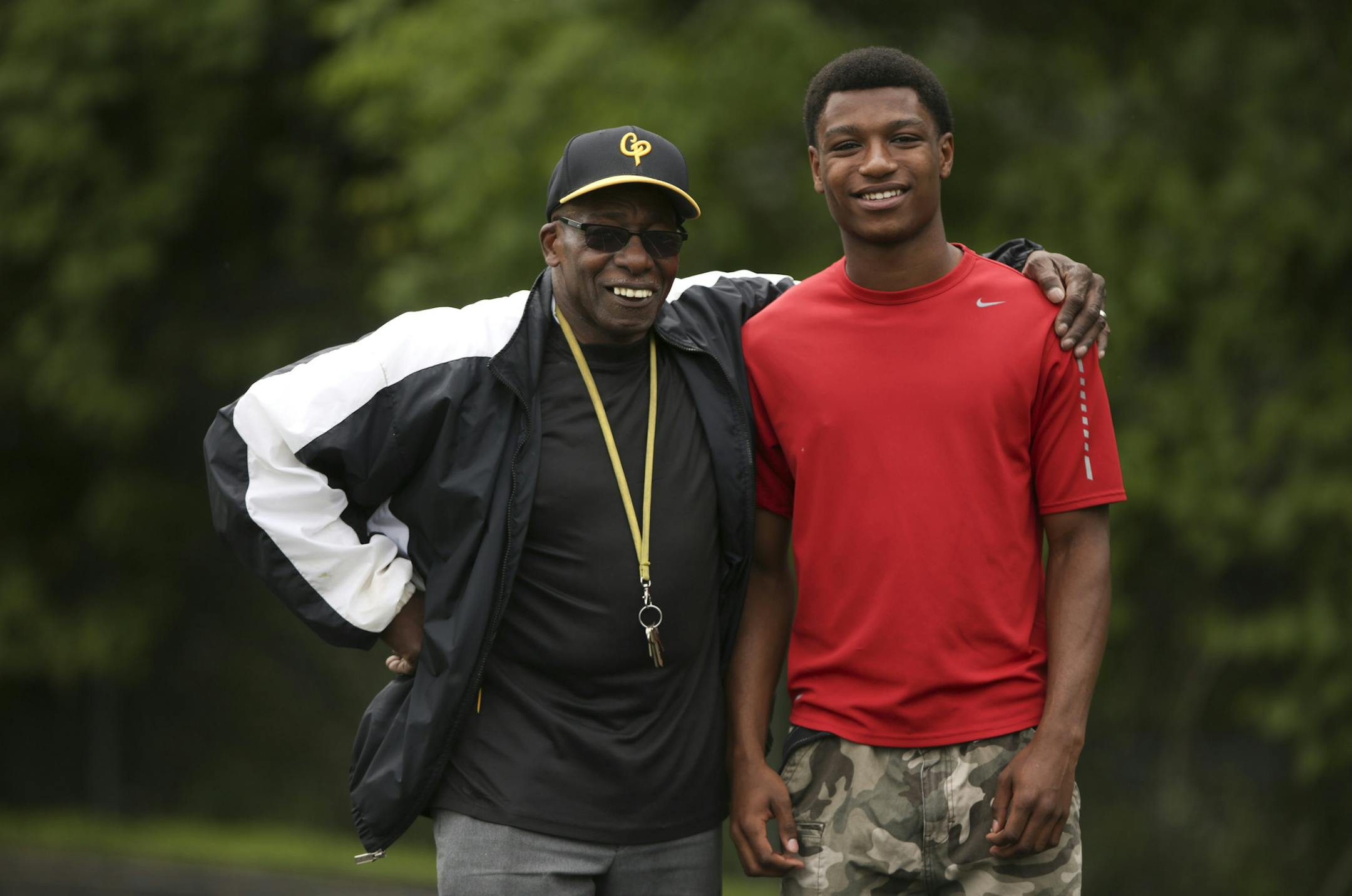 Marvin Rouse, left, with Trevon Clay at the Como Park Senior High School track Thursday afternoon in St. Paul. ] JEFF WHEELER ‚Ä¢ jeff.wheeler@startribune.com Como Park sophomore Trevon Clay, who won boththe 110 and the 300 meter hurdles in the Section 4AA track meet looks to be a medal contender in those events at Saturday's state meet. Trey's been taken under the wing of the school's specialty coach, seventy-five year old Marvin Rouse.