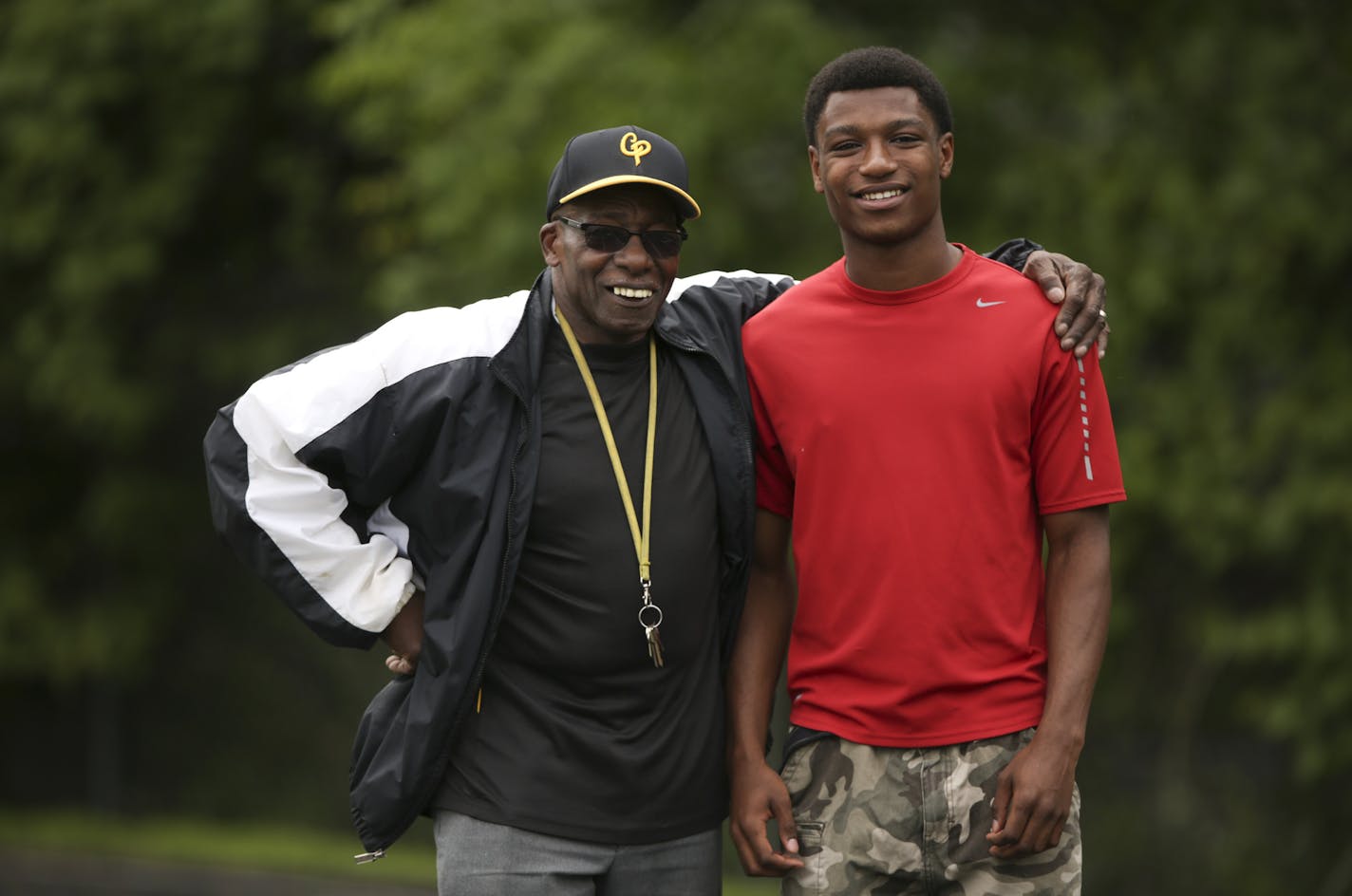 Marvin Rouse, left, with Trevon Clay at the Como Park Senior High School track Thursday afternoon in St. Paul. ] JEFF WHEELER &#x201a;&#xc4;&#xa2; jeff.wheeler@startribune.com Como Park sophomore Trevon Clay, who won boththe 110 and the 300 meter hurdles in the Section 4AA track meet looks to be a medal contender in those events at Saturday's state meet. Trey's been taken under the wing of the school's specialty coach, seventy-five year old Marvin Rouse.