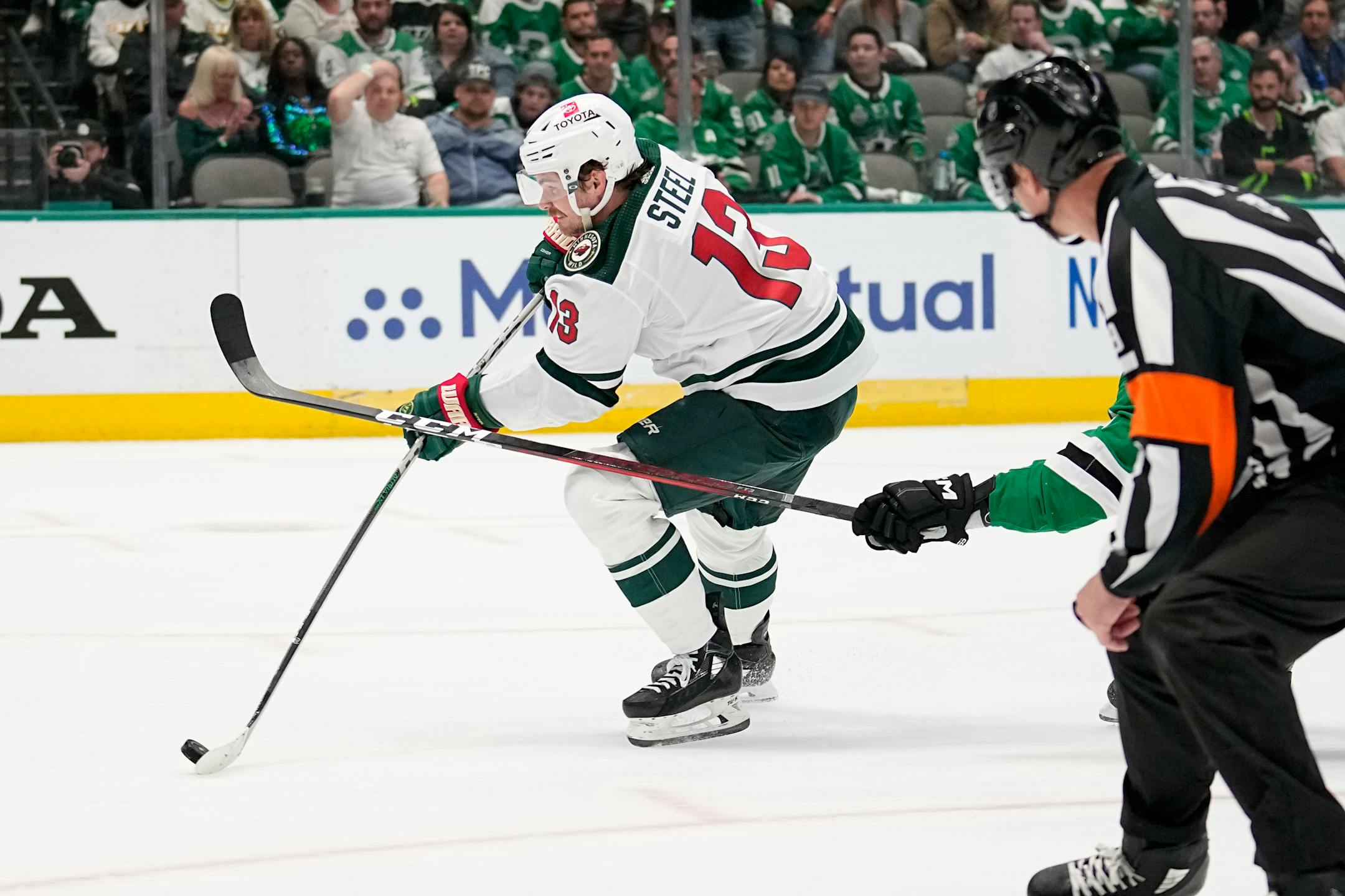 Minnesota Wild center Sam Steel takes a shot and scores in the second period of Game 1.
