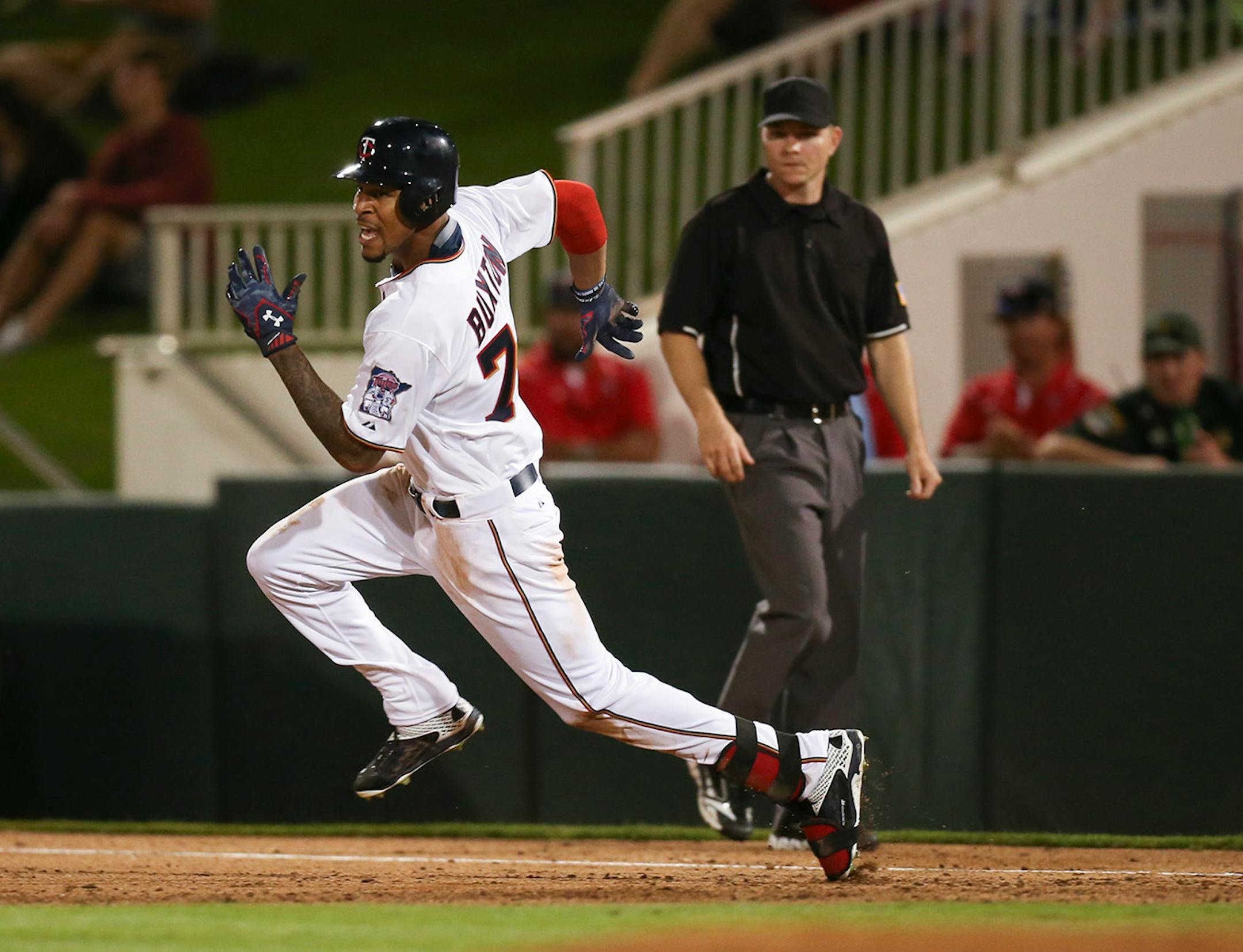 Minnesota Twins center fielder Byron Buxton sprinted to second after his second double of the game Wednesday night at Hammond Stadium.