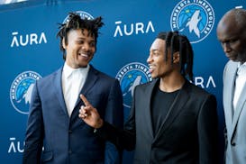 New Timberwolves guards Terrence Shannon Jr., left, and Rob Dillingham chat after a news conference Wednesday at Target Center.