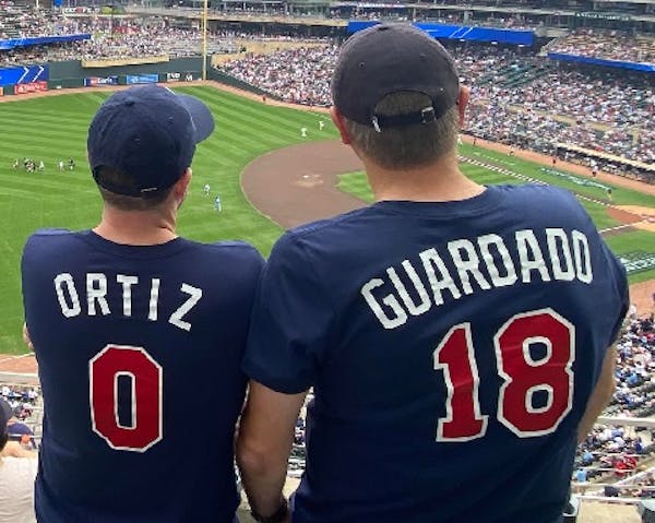 It wasn’t a coincidence that Twins fans Nick Wold and Dave Montgomery wore these shirts to see the wild-series against Toronto.