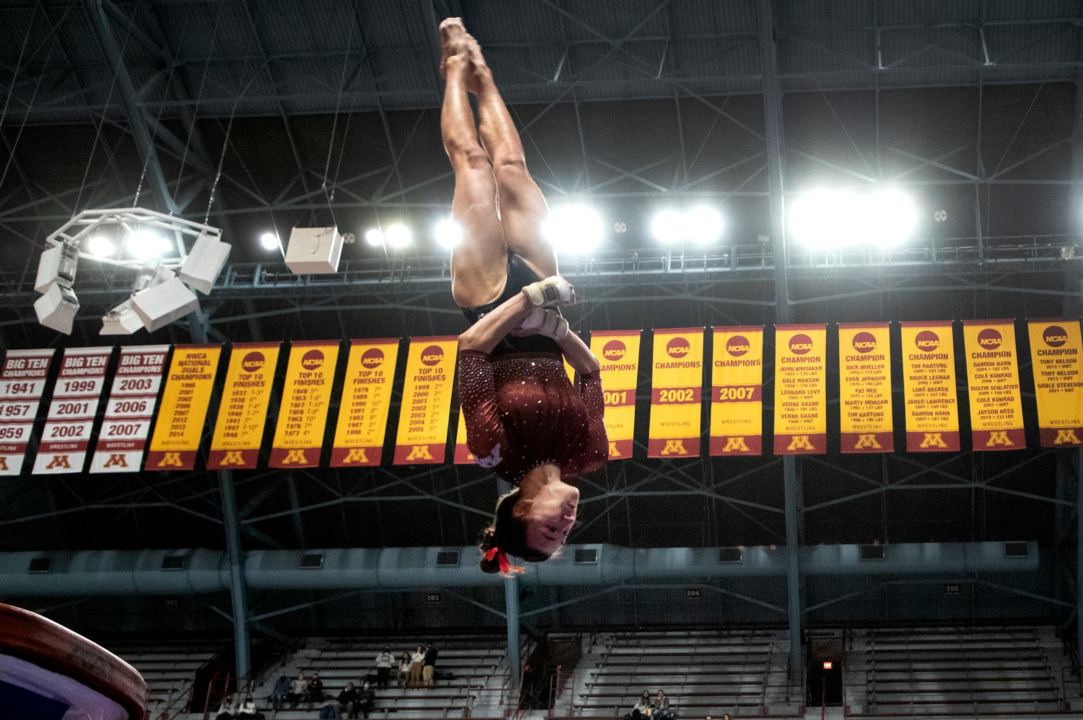 Ona Loper of Minnesota competes in the vault.