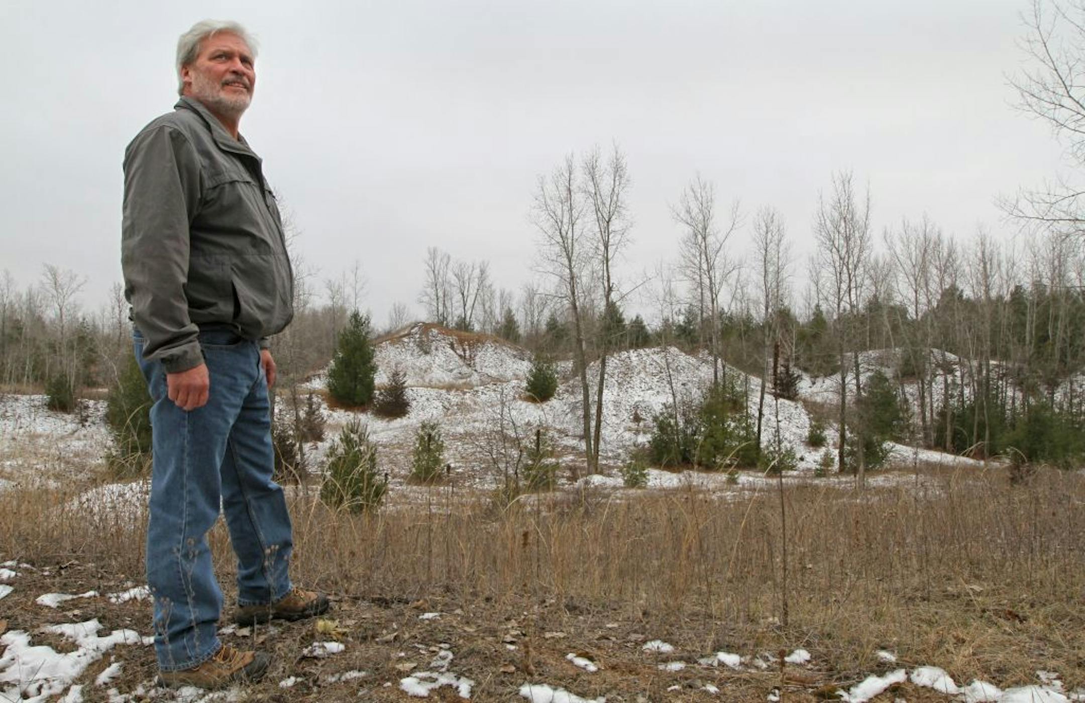 Mike Caron, Director of Land Use Affairs for Tiller Corporation, gave a tour of the site of the old Scandia Minnesota gravel mine that Tiller Corp. wants to reopen and turn it into a profitable gravel mine. The site covers 114 acres, of which 64 acres would be reclaimed and mined in the operation. Photographed on 11/30/12.