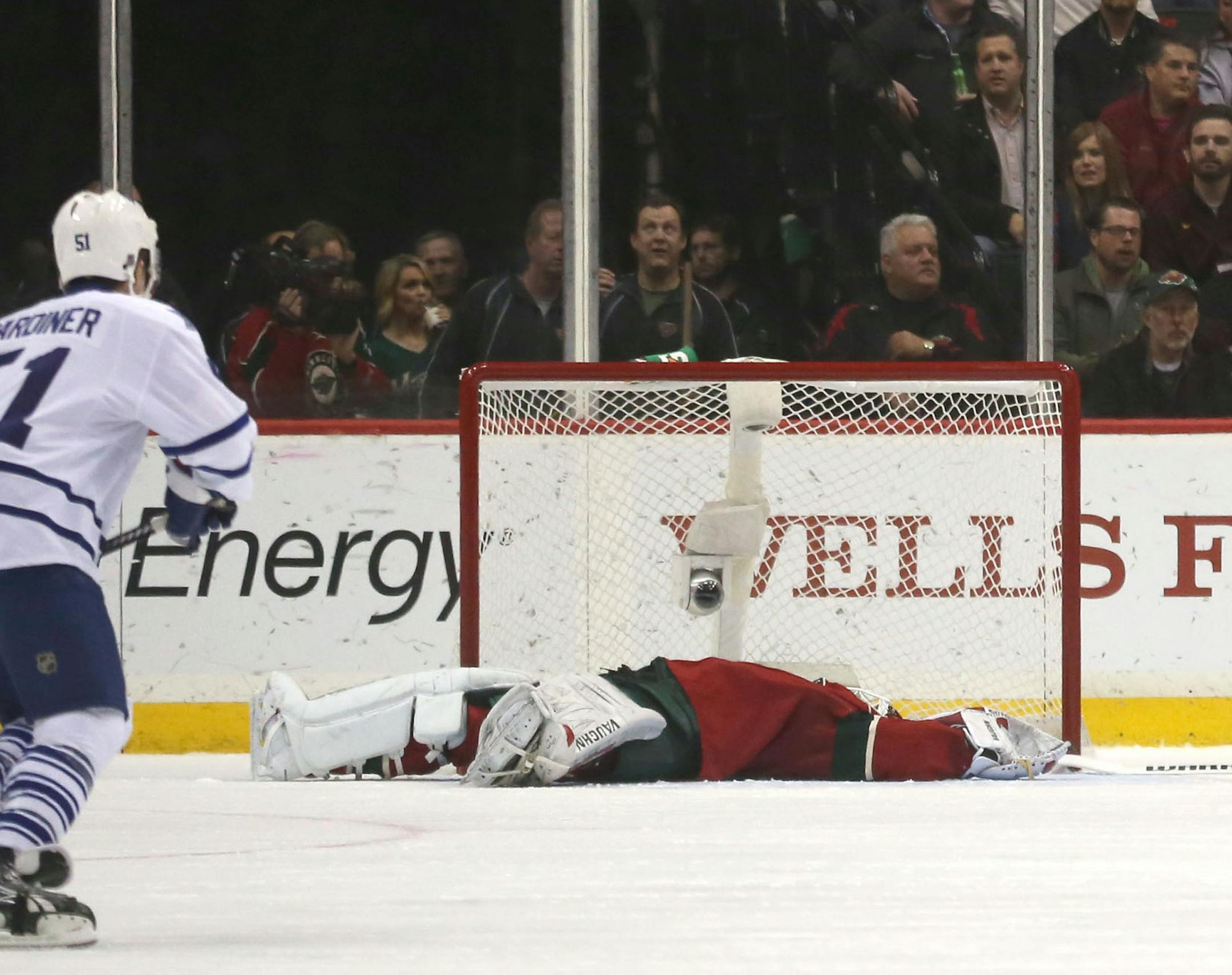 Wild goalie Nicklas Backstrom laid on the ice after being hit by Maple Leaf Nazem Kadri during the first period at the Xcel Energy Center.