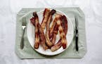 FILE-- A plate of bacon in New Orleans, July 28, 2016. A recent report from the Department of Agriculture, boosted by the Ohio Pork Council, reported 