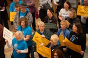 Affordable housing advocates gathered in the rotunda inside the State Capitol in St. Paul on Tuesday.