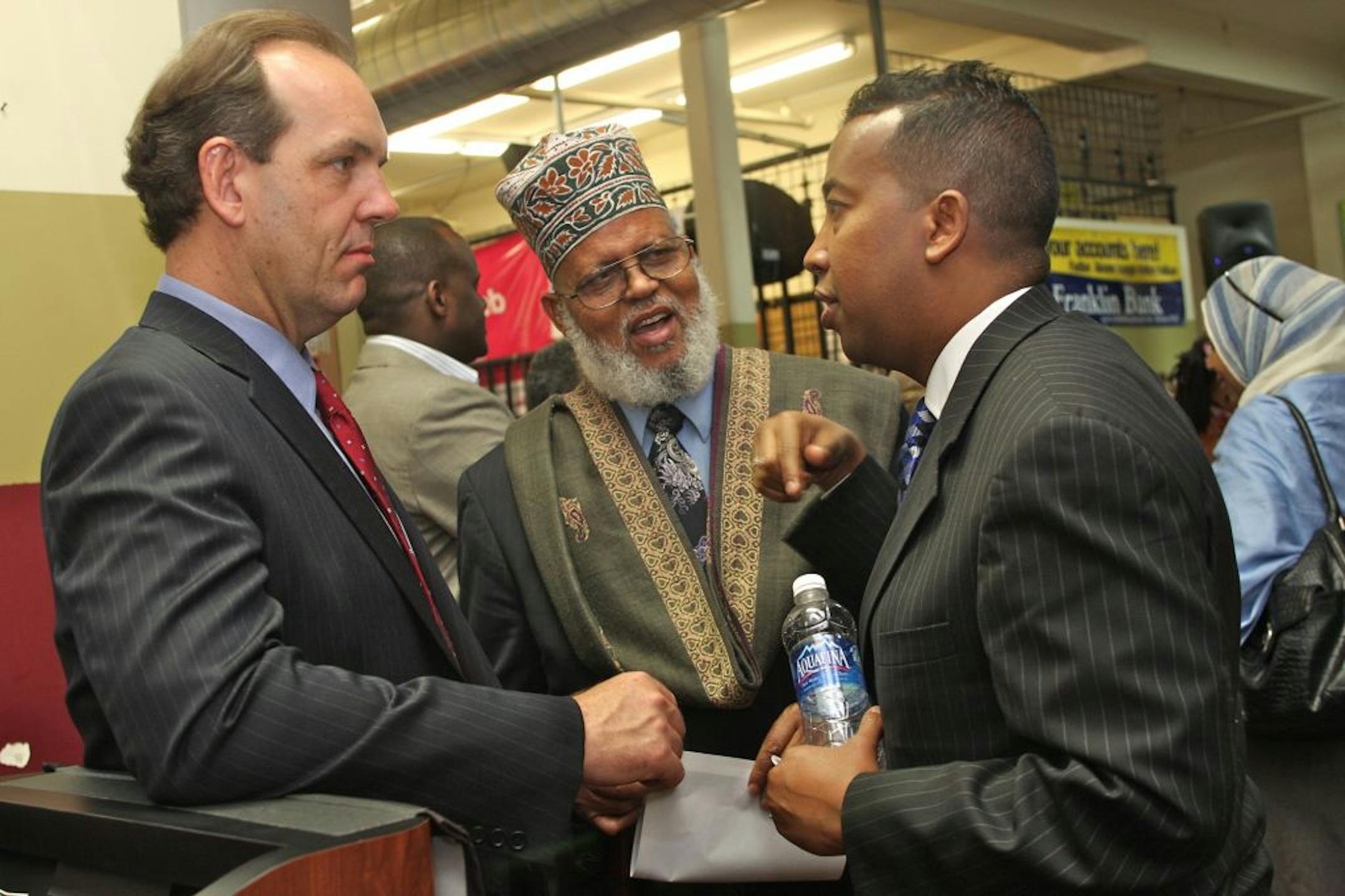 American Refugee Committee of President Daniel Wordsworth with Somali immigrant leaders Imam Sheikh Saad Musse Roble (center) and Ali Yusef