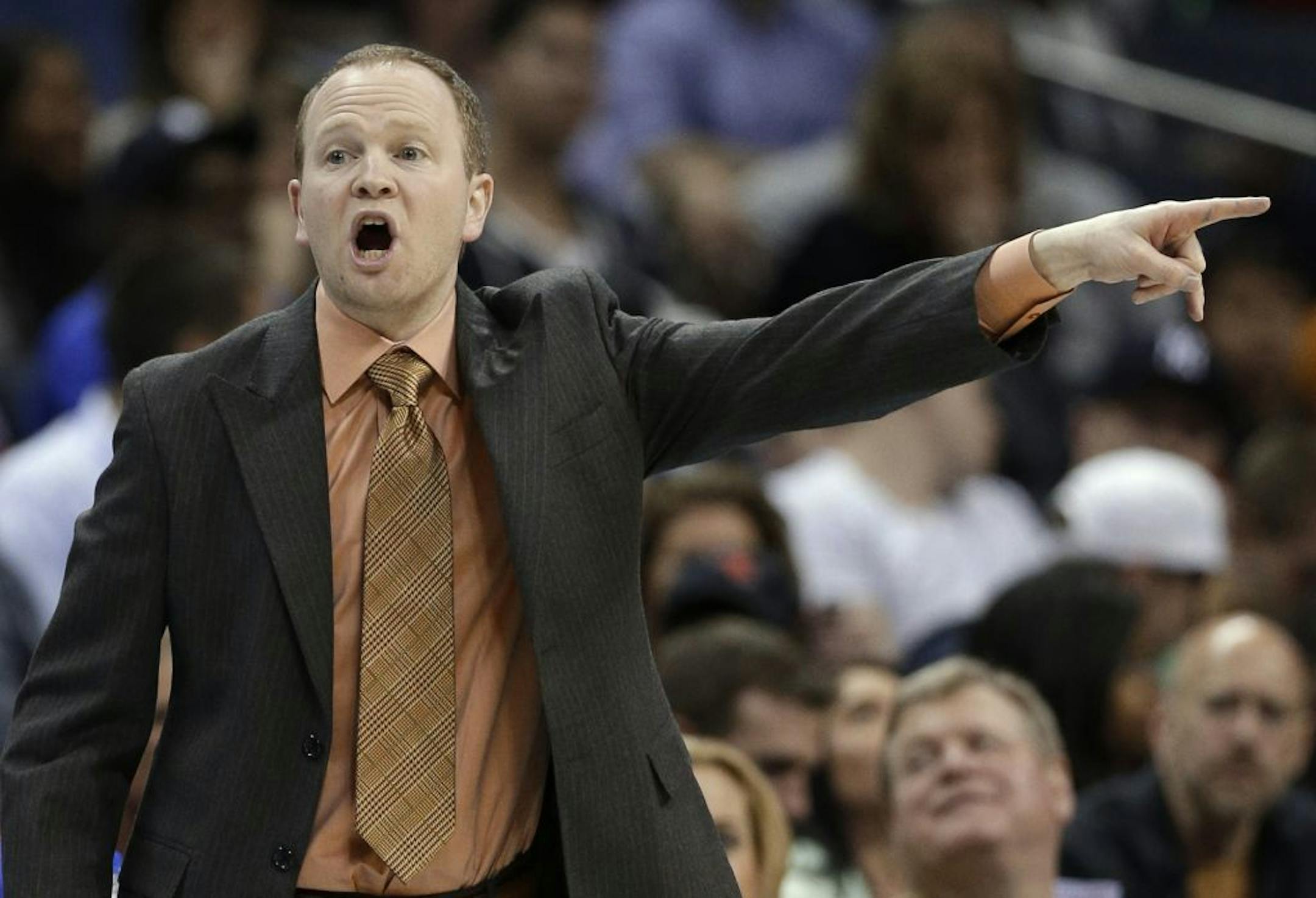 Detroit Pistons coach Lawrence Frank talks to his players during the first half of an NBA basketball game against the Charlotte Bobcats in Charlotte, N.C., Saturday, March 23, 2013.