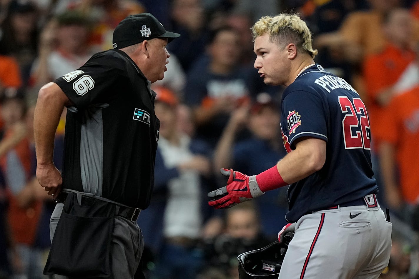 Atlanta Braves' Joc Pederson argues a call with home plate umpire Ron Kulpa during the eighth inning in Game 2 of baseball's World Series between the Houston Astros and the Atlanta Braves Wednesday, Oct. 27, 2021, in Houston. (AP Photo/David J. Phillip)