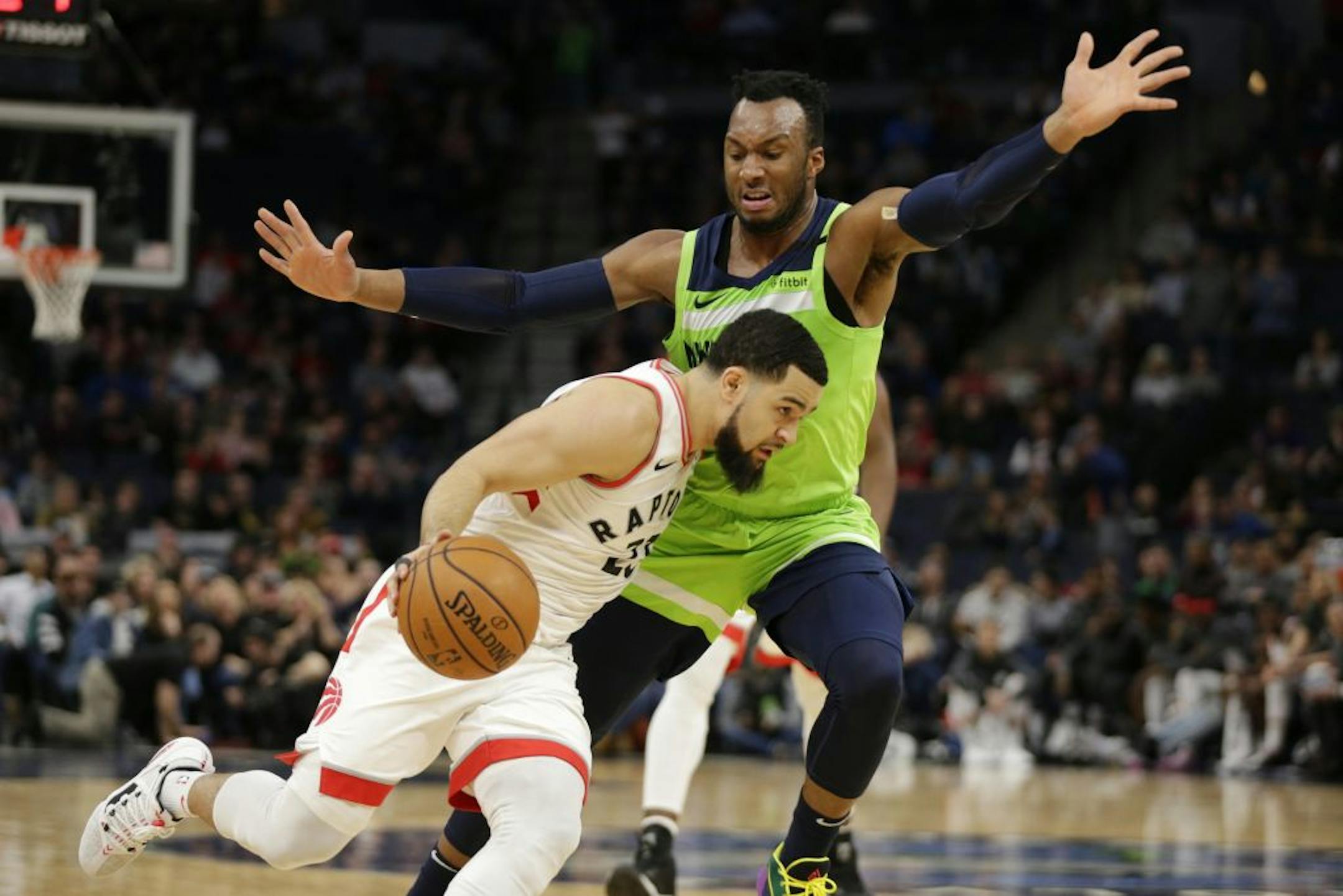 Toronto Raptors guard Fred VanVleet (23) drives against Minnesota Timberwolves guard Josh Okogie in the third quarter of an NBA basketball game Saturday, Jan. 18, 2020, in Minneapolis.