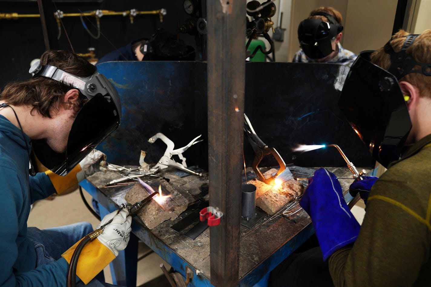 Students, including Will Curtis of Red Wing, left, practiced their welding technique. ] ANTHONY SOUFFLE &#x2022; anthony.souffle@startribune.com Students in the first ever two-year Associate of Applied Science degree program in Bicycle Design and Fabrication practiced their welding, which they'll later use on bike frames and parts, under the direction of welding instructor Mike Ford and course instructor Chase Spaulding Tuesday, Nov. 5, 2019 at the Minnesota State College Southeast's campus in R