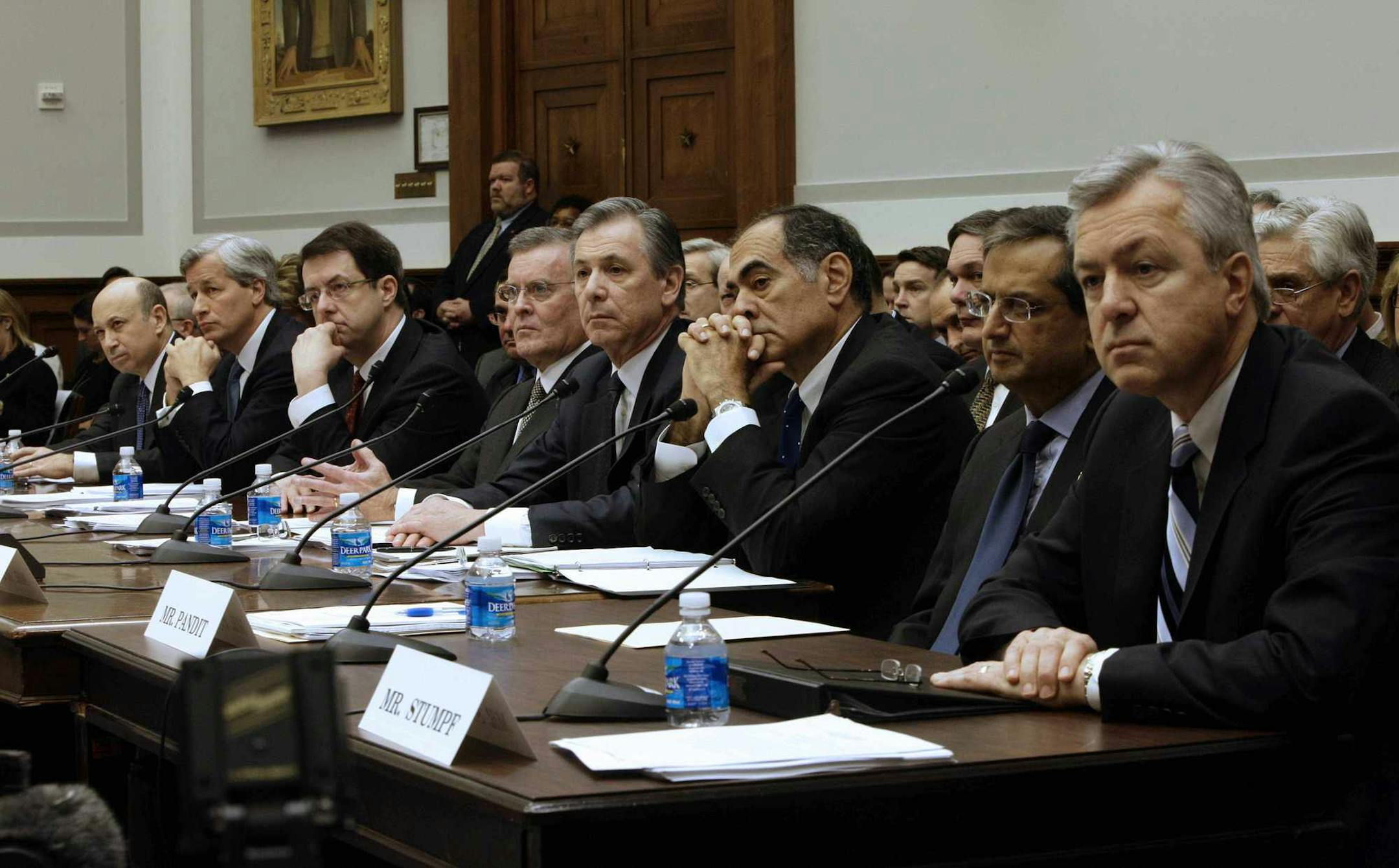 (NYT17) WASHINGTON -- Feb. 11, 2009 -- ECON-BAILOUT-1 -- Eight of the nationís top bankers before the House Financial Services Committee on Wednesday morning, Feb. 11, 2009, on Capitol Hill. The executives were explaining how they used their portion of the government's $700 billion banking bailout and whether they plan to seek more. From left: Lloyd Blankfein, of Goldman Sachs; James Dimon, of JPMorgan Chase; Robert Kelly of Bank of New York Mellon; Ken Lewis of Bank of America; Ronald Logu