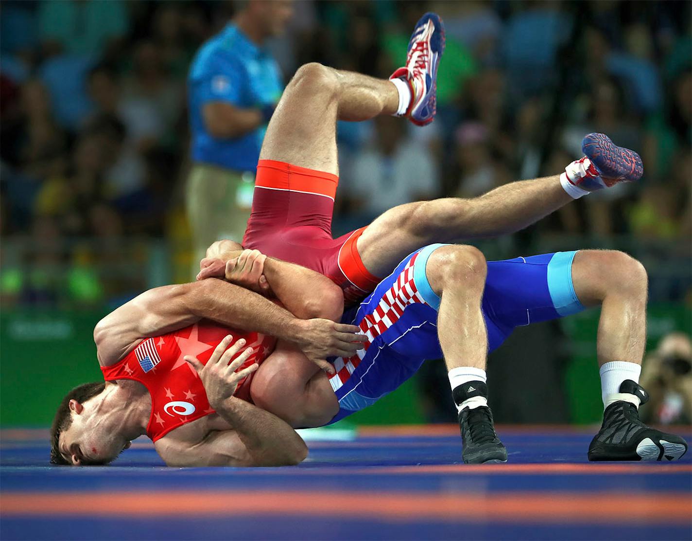 Andy Bisek of Chaska won his first match at the Olympics on Sunday, beating Yurisandi Hernandez Rios of Cuba 1-0 in the Greco-Roman 75-kilogram (165 pounds) division at Carioca Arena 2. Unfortunately Bisek lost his second match (Shown here) to Bozo Starcevic of Croatia in the quarterfinal match.