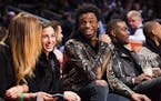 Minnesota Timberwolves Andrew Wiggins, center, laughs during the NBA all-star skills competition in Toronto on Saturday, Feb. 13, 2016. (Mark Blinch/T