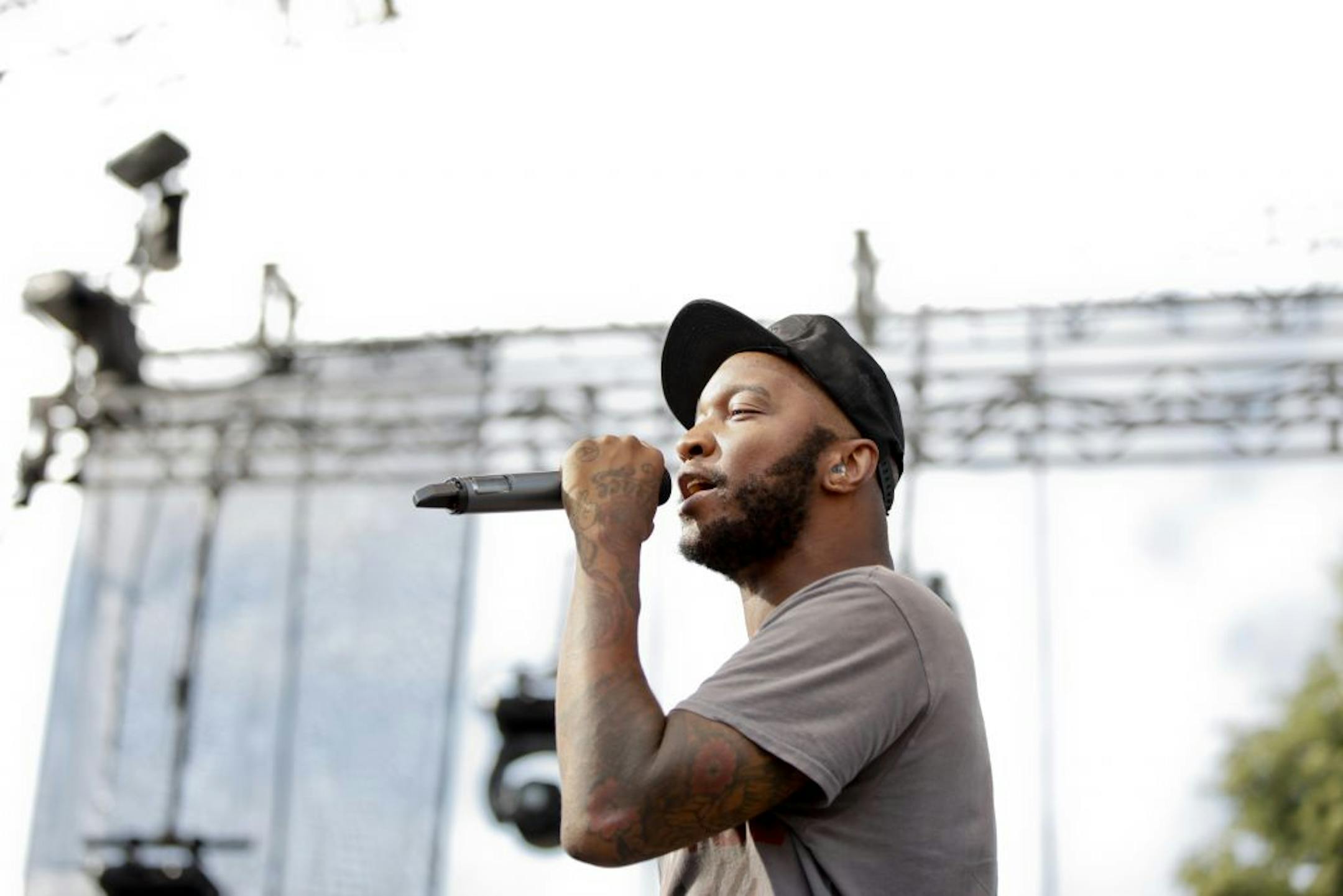 P.O.S. of Doomtree hypes up the crowd during the first song at the 2012 Rock the Garden concert in Minneapolis, Minn. on Saturday, June 16, 2012.