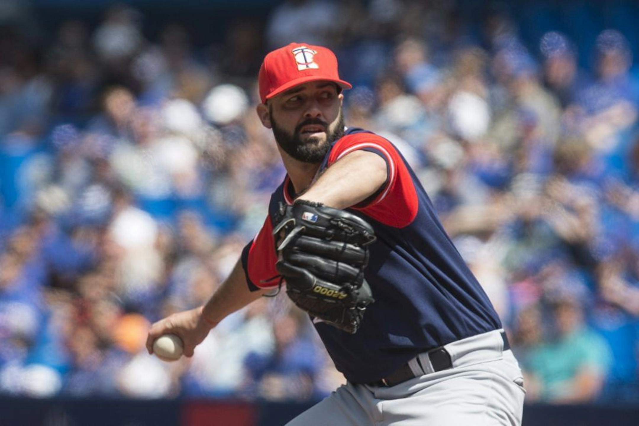Minnesota Twins starting pitcher Dillon Gee works against Toronto Blue Jays during first inning American League MLB baseball action in Toronto on Saturday, Aug. 26 2017.