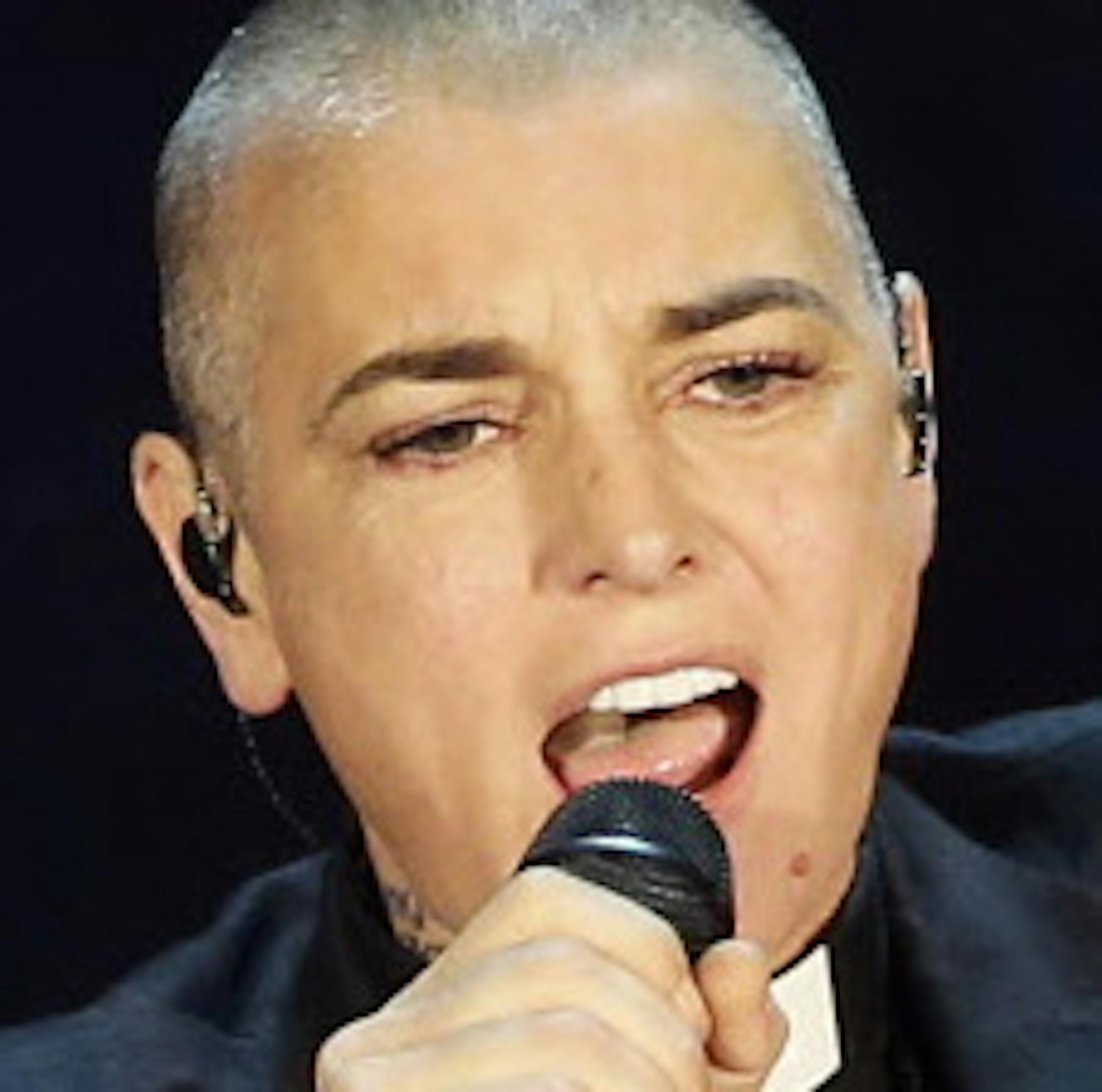 FILE - In this Oct. 5, 2014 file photo, Irish singer Sinead O'Connor performs during the Italian State RAI TV program "Che Tempo che Fa", in Milan, Italy. Police in suburban Chicago have put out a well-being check for the Irish singer. Wilmette police released a statement Monday, May 16, 2016, saying O'Connor reportedly left the area for a bicycle ride at 6 a.m. Sunday and hasn't returned. (AP Photo/Antonio Calanni, File)