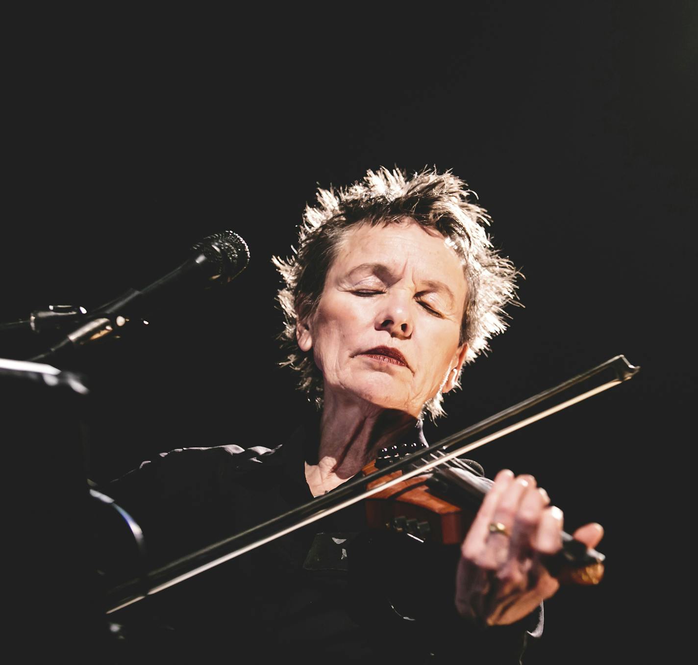 PHOTO MOVED IN ADVANCE AND NOT FOR USE - ONLINE OR IN PRINT - BEFORE FEB. 21, 2016. -- FILE -- Laurie Anderson performs with the Kronos Quartet at the Big Ears festival in Knoxville, Tenn., March 28, 2015. Anderson returns to Big Ears this year and is also scheduled for Moogfest, which returns after a hiatus with a change of location, to Durham, N.C., May 19-22, 2016. (Jake Giles Netter/The New York Times) ORG XMIT: XNYT84