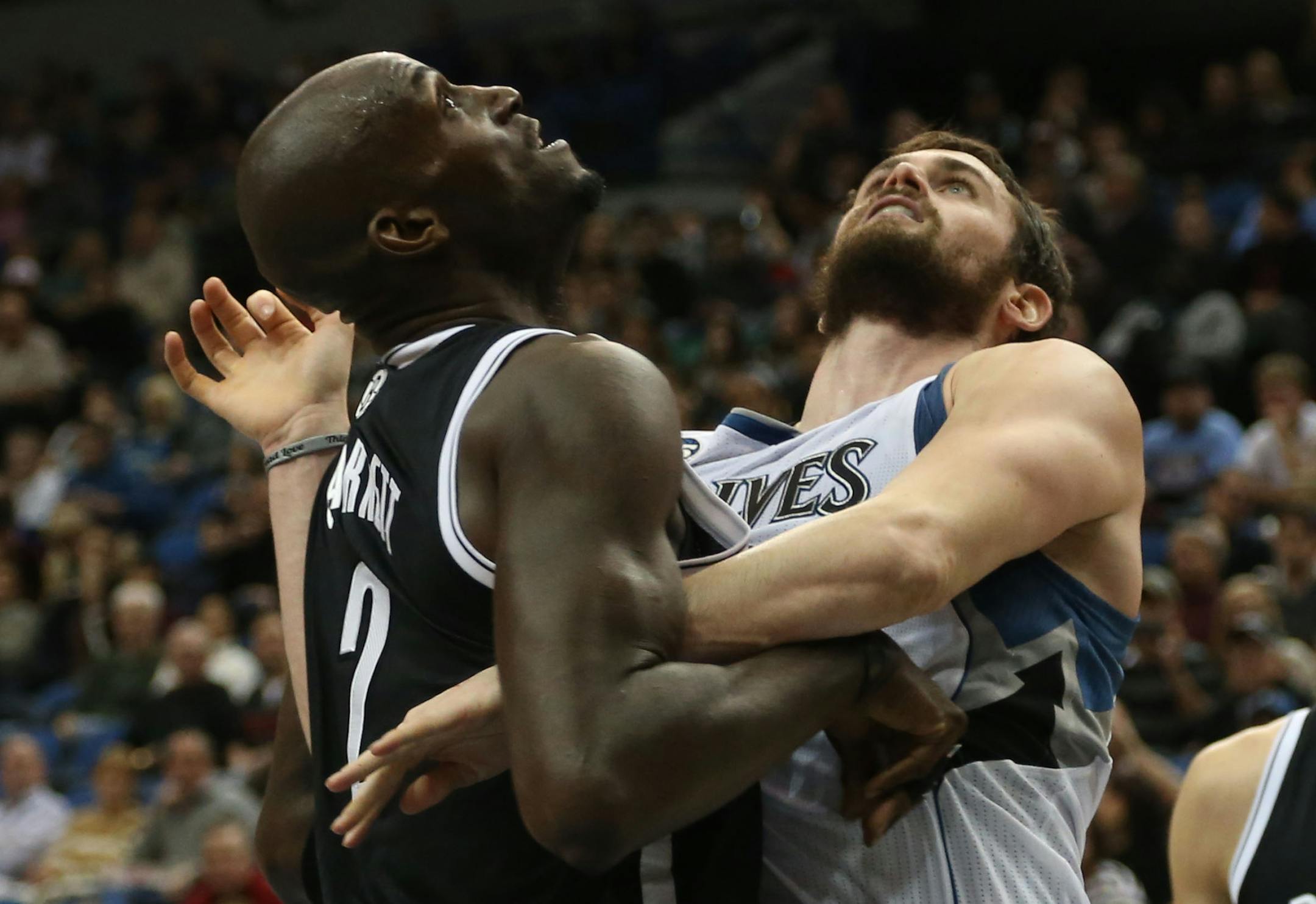 Wolves Kevin Love and Nets Kevin Garnett fought for position under the basket during the first half at the Target Center in Minneapolis, Friday, November 22, 2013. ] (KYNDELL HARKNESS/STAR TRIBUNE) kyndell.harkness@startribune.com