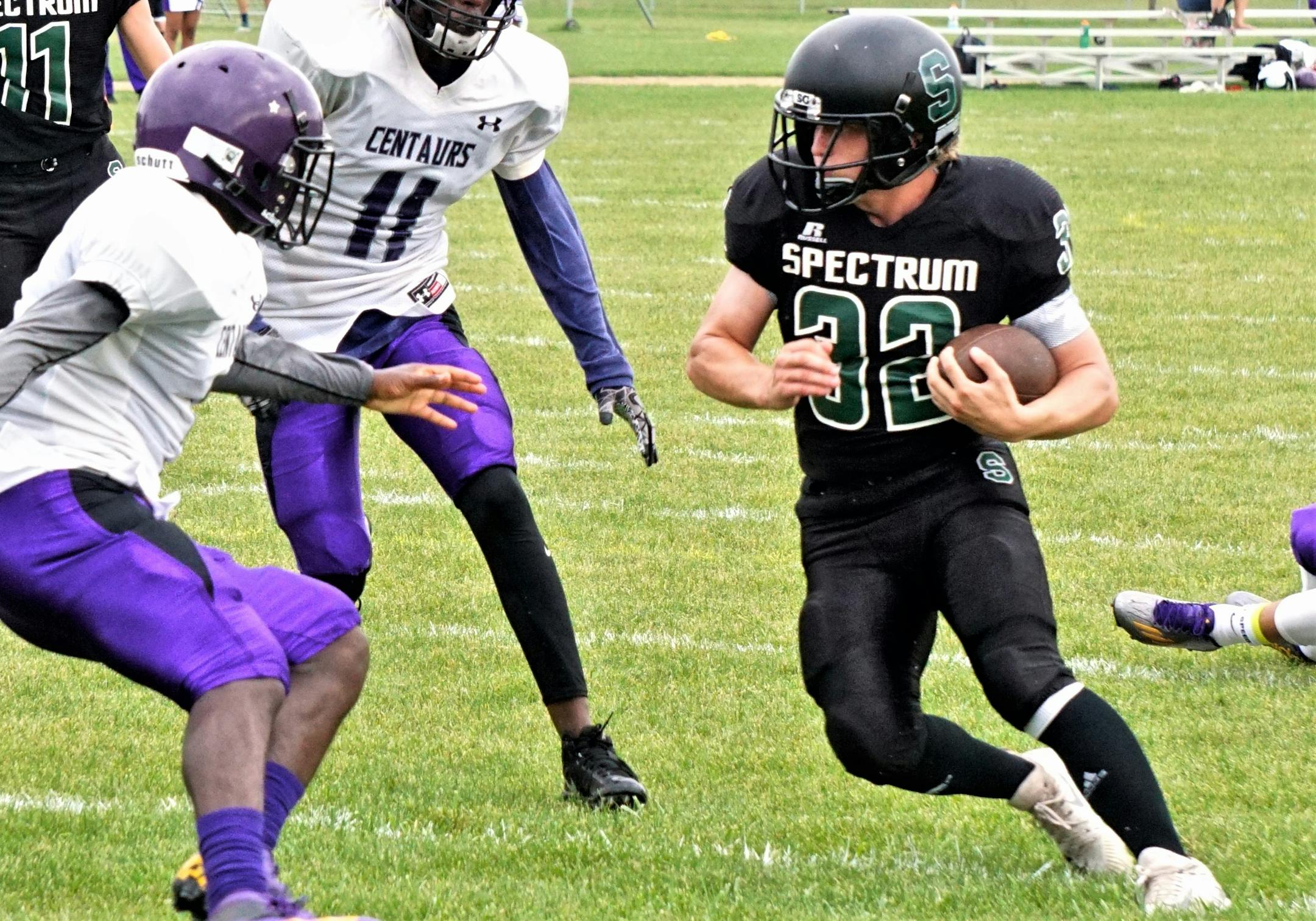 Spectrum running back Fisher Marberg (shown against Brooklyn Center in early September) ran for 170 yards and four touchdowns in a 66-8 rout of Minneapolis Edison, allowing him to become only the 15th player in state history to rush for over 5,000 career yards.