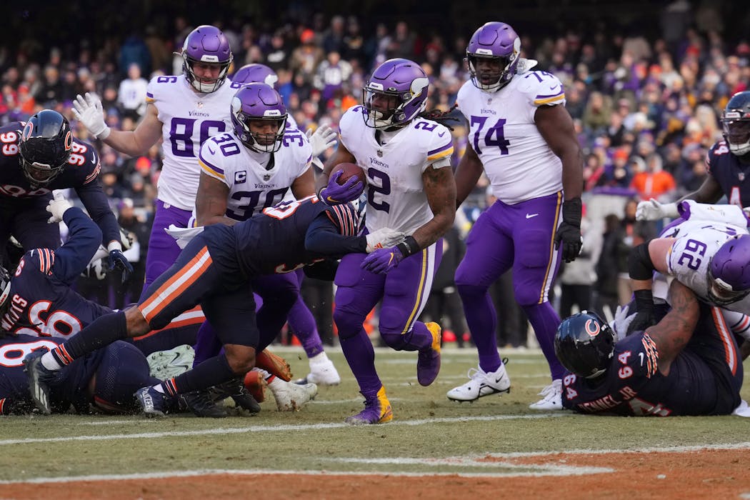  Vikings running back Alexander Mattison (2) scored on two 1-yard touchdown runs against the Bears. 