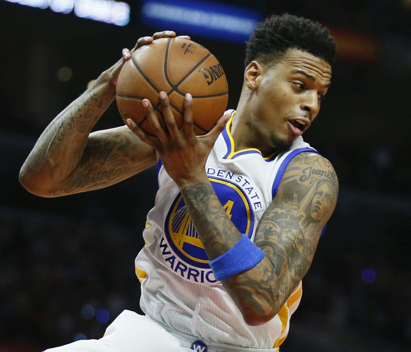 Golden State Warriors' Brandon Rush brings in a rebound against the Los Angeles Clippers during the first half of an NBA basketball game, Saturday, Feb. 20, 2016, in Los Angeles. (AP Photo/Danny Moloshok) ORG XMIT: NYOTK