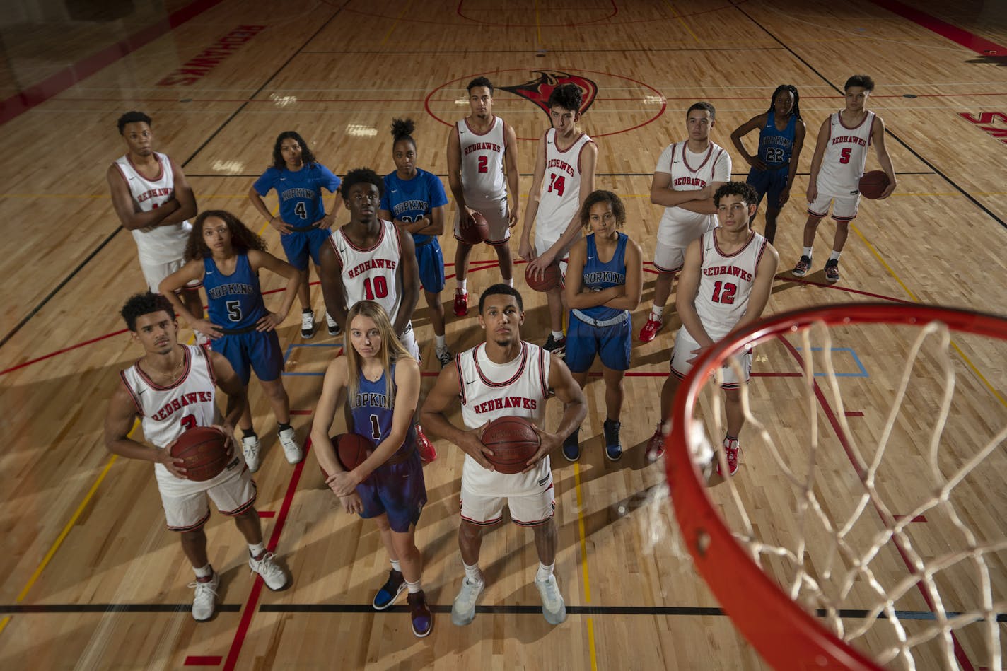 With Hopkins' Paige Bueckers and Minnehaha Academy's Jalen Suggs, front and center and both wearing No. 1, the other Division I bound players on the two teams joined them for a group portrait. ] JEFF WHEELER &#x2022; Jeff.Wheeler@startribune.com The Minnehaha Academy boy's basketball team and the Hopkins high school girl's basketball team are made up of an extraordinary number of student athletes expected to extend their playing careers to Division I schools. They gathered for a group portrait S