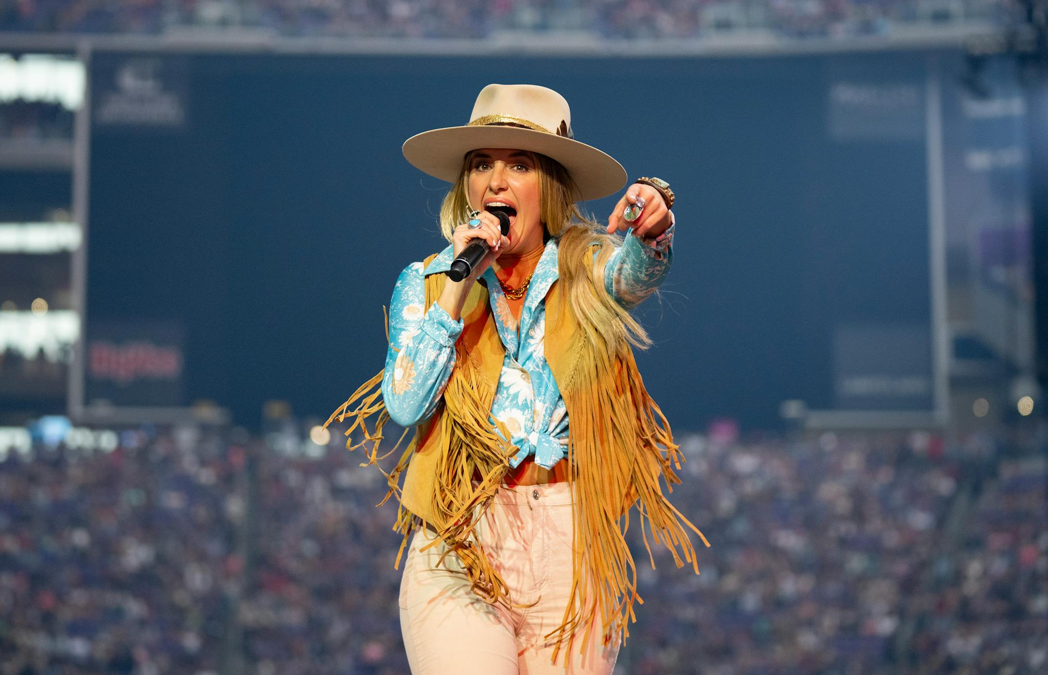 Lainey Wilson opened for Luke Combs at U.S. Bank Stadium.