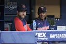 Twins manager Rocco Baldelli, left, and assistant bench coach Tony Diaz