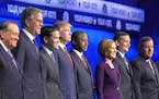 Republican presidential candidates, from left, John Kasich, Mike Huckabee, Jeb Bush, Marco Rubio, Donald Trump, Ben Carson, Carly Fiorina, Ted Cruz, C