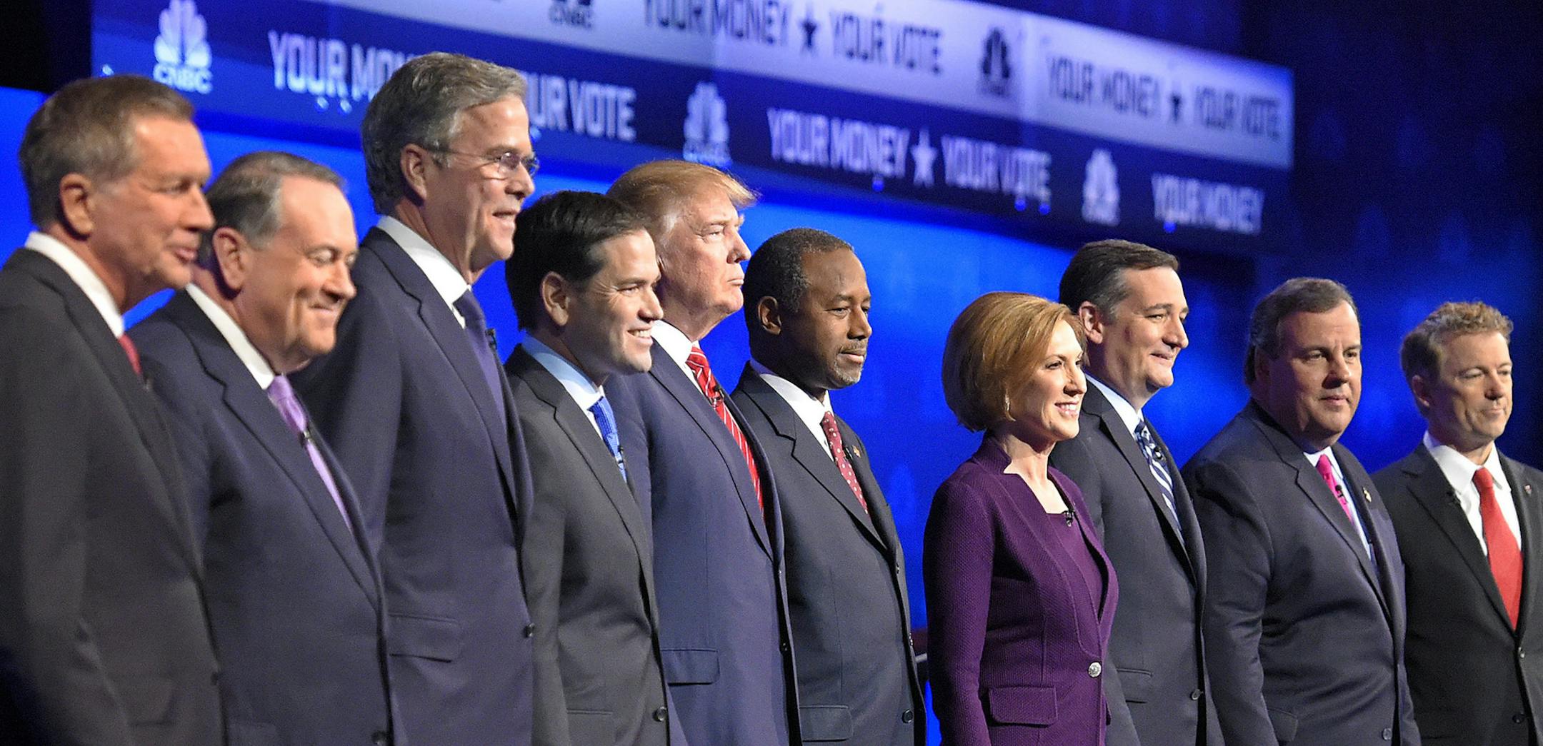 Republican presidential candidates, from left, John Kasich, Mike Huckabee, Jeb Bush, Marco Rubio, Donald Trump, Ben Carson, Carly Fiorina, Ted Cruz, Chris Christie, and Rand Paul take the stage during the CNBC Republican presidential debate at the University of Colorado, Wednesday, Oct. 28, 2015, in Boulder, Colo. (AP Photo/Mark J. Terrill) ORG XMIT: MIN2015102910163918