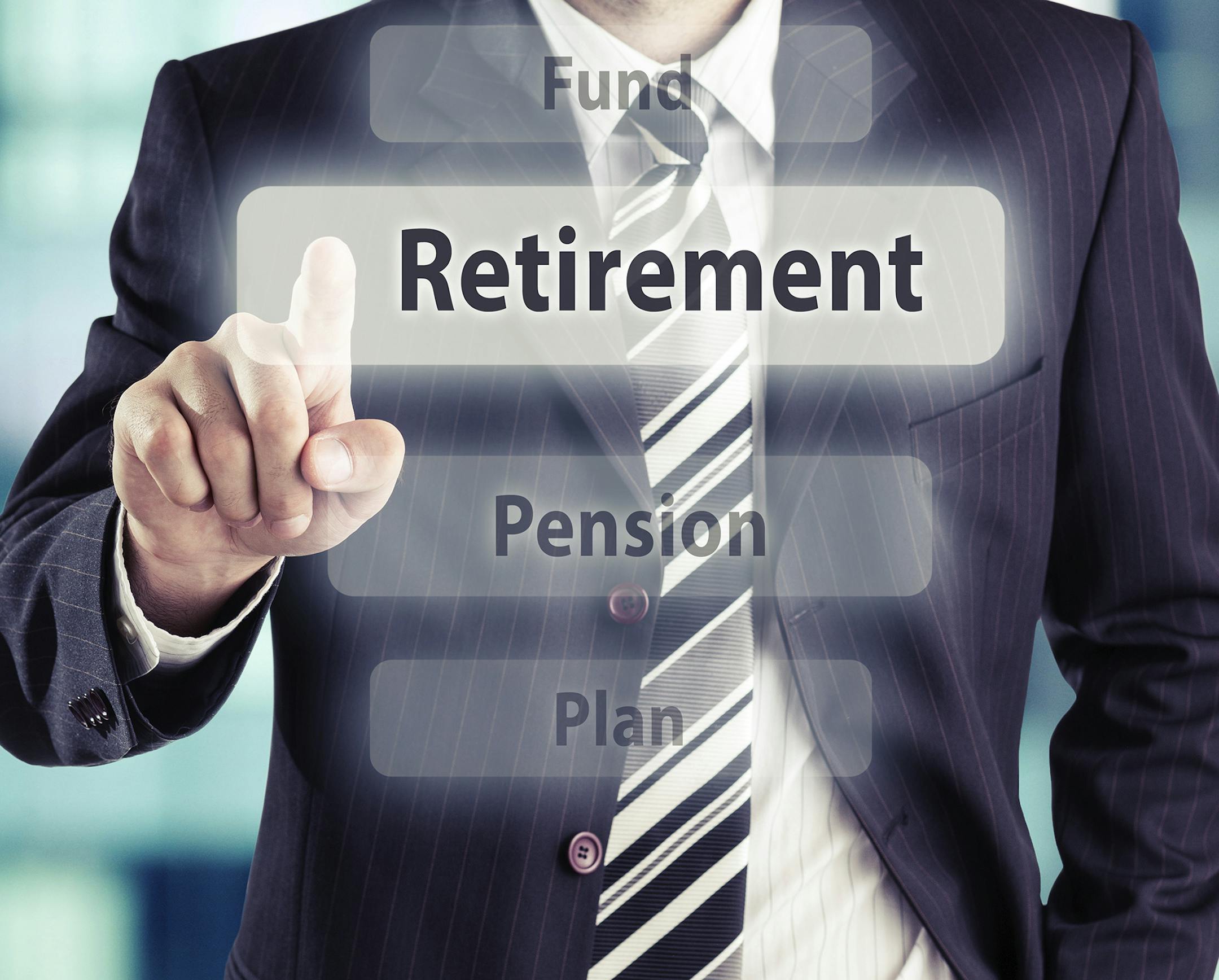 Man pressing retirement button. Retirement concept, toned photo.