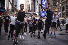 Travis Wall, left, and Robbie Fairchild lead a class for dancers near the studios of &#x201c;Good Morning America&#x201d; in Times Square, after Lara 
