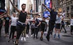 Travis Wall, left, and Robbie Fairchild lead a class for dancers near the studios of &#x201c;Good Morning America&#x201d; in Times Square, after Lara 