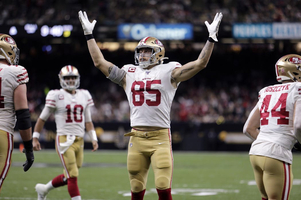 49ers tight end George Kittle celebrates his touchdown against the Saints.