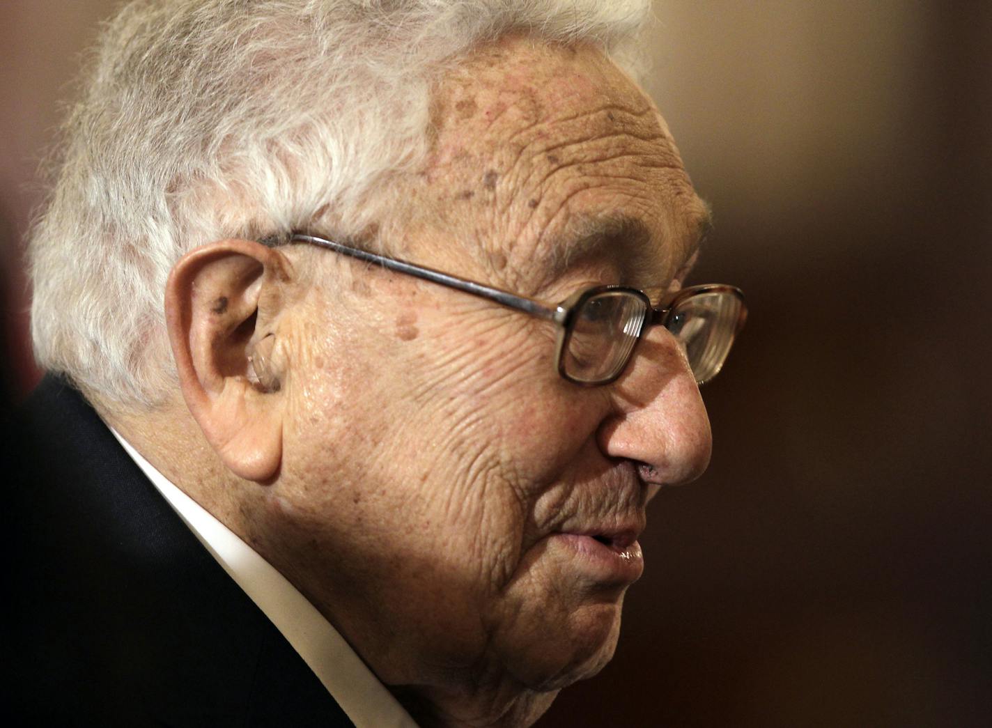 Former Secretary of State Henry Kissinger attends a luncheon for Japanese Prime Minister Shinzo Abe at the State Department in Washington, Tuesday, April 28, 2015.(AP Photo/Luis M. Alvarez) ORG XMIT: DCLA115