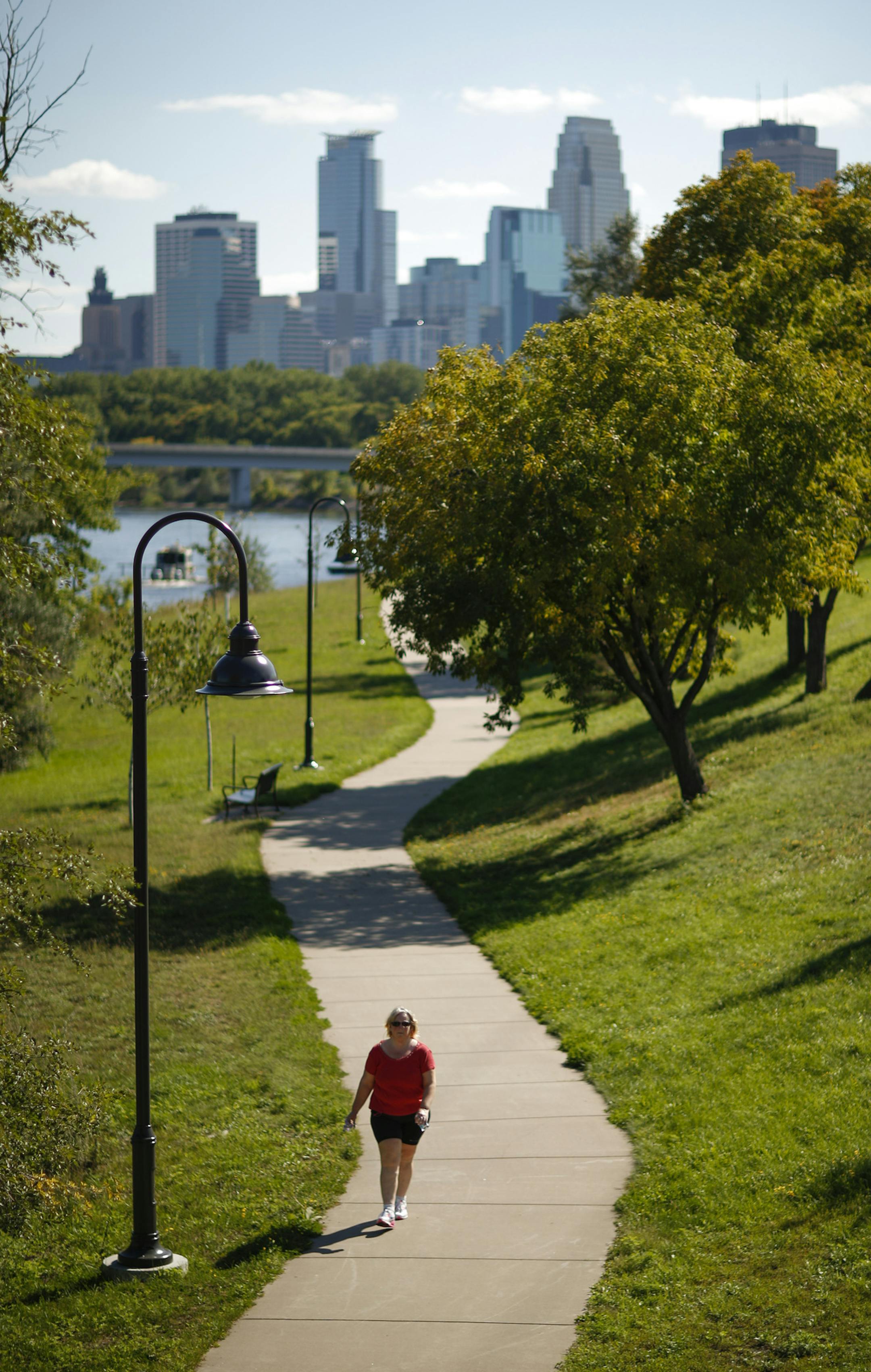 The walking trail on the west bank of the Mississippi River north of Plymouth Ave. ] JEFF WHEELER • jeff.wheeler@startribune.com Fifteen years after a sweeping plan to change the upper riverfront of Minneapolis was unveiled, much of even its first-stage projects for converting industrial land to parks and housing remain undone. Some projects are gaining momentum, such as extending trails up the river's east bank to match those on the west side, or creating a new river island for habitat a