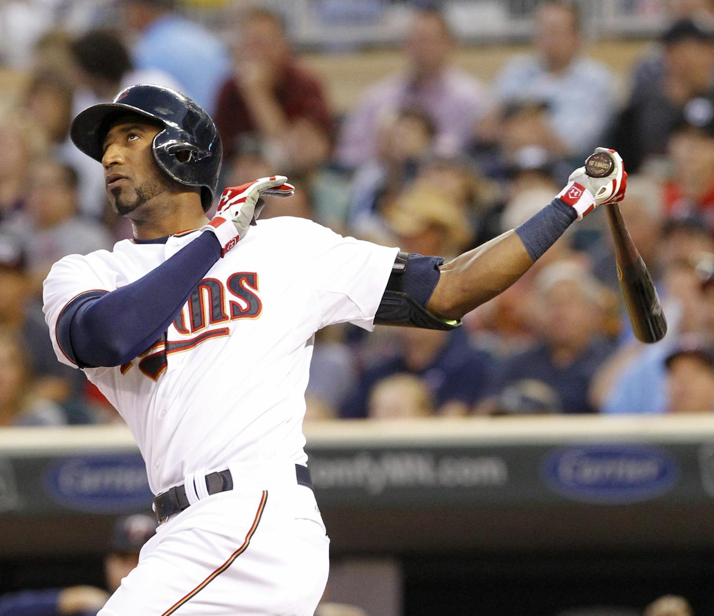 Minnesota Twins' Eduardo Nunez follows through on a solo home run off Houston Astros starting pitcher Scott Kazmir during the third inning of a baseball game in Minneapolis, Friday, Aug. 28, 2015. (AP Photo/Ann Heisenfelt)