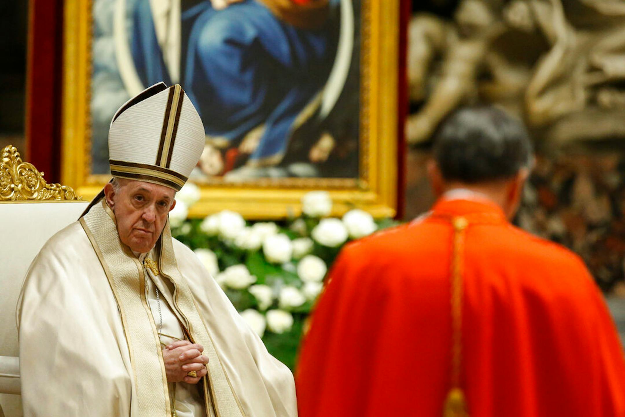 Pope Francis attends a consistory ceremony where 13 bishops were elevated to a cardinal's rank in St. Peter's Basilica at the Vatican, Saturday, Nov. 28, 2020.