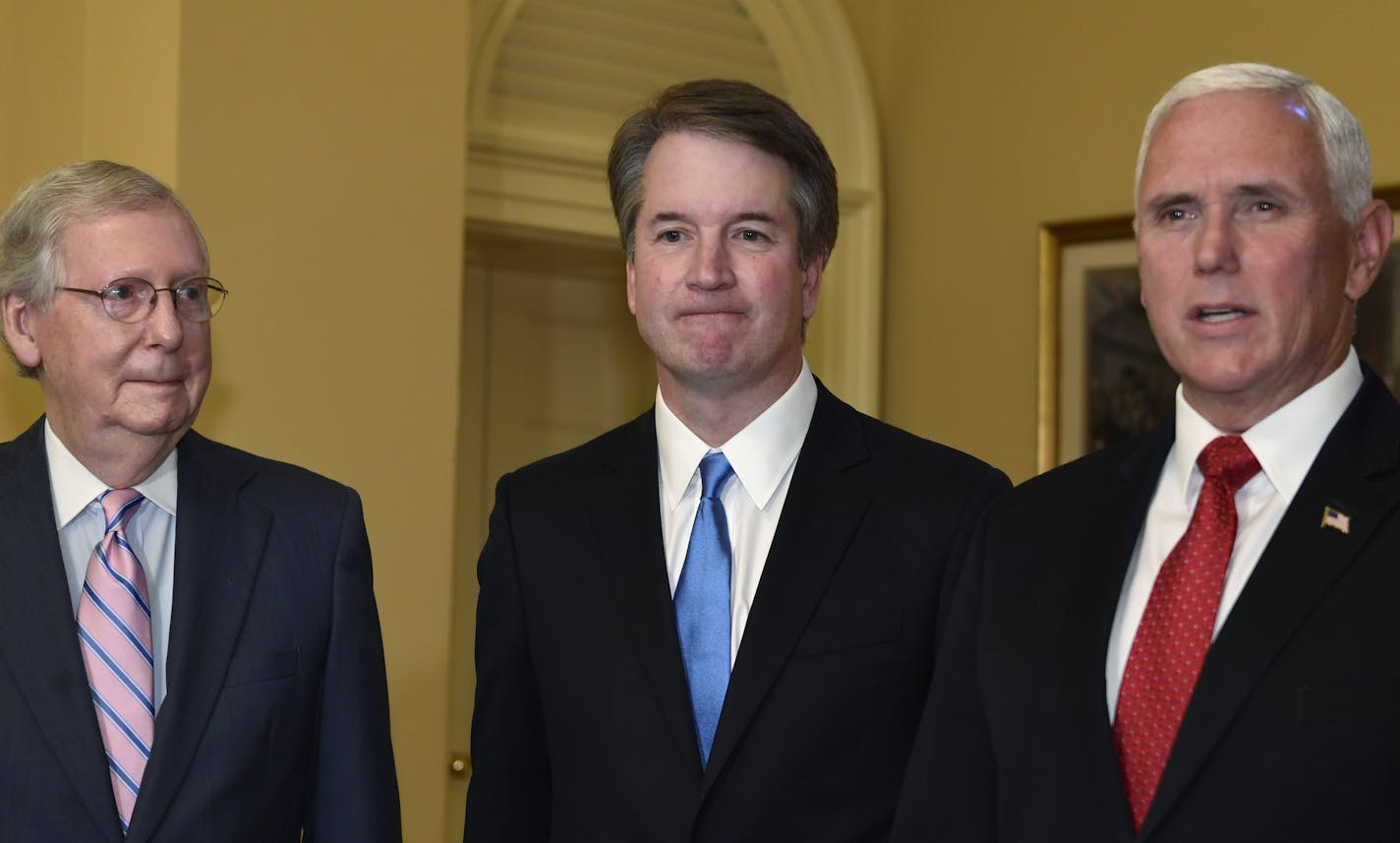 Vice President Mike Pence, right, speaks about Supreme Court nominee Brett Kavanaugh, center, as Senate Majority Leader Mitch McConnell of Ky., left, listens during a visit to Capitol Hill in Washington, Tuesday, July 10, 2018. Kavanaugh is on Capitol Hill to meet with Republican leaders as the battle begins over his nomination to the Supreme Court. (AP Photo/Susan Walsh)