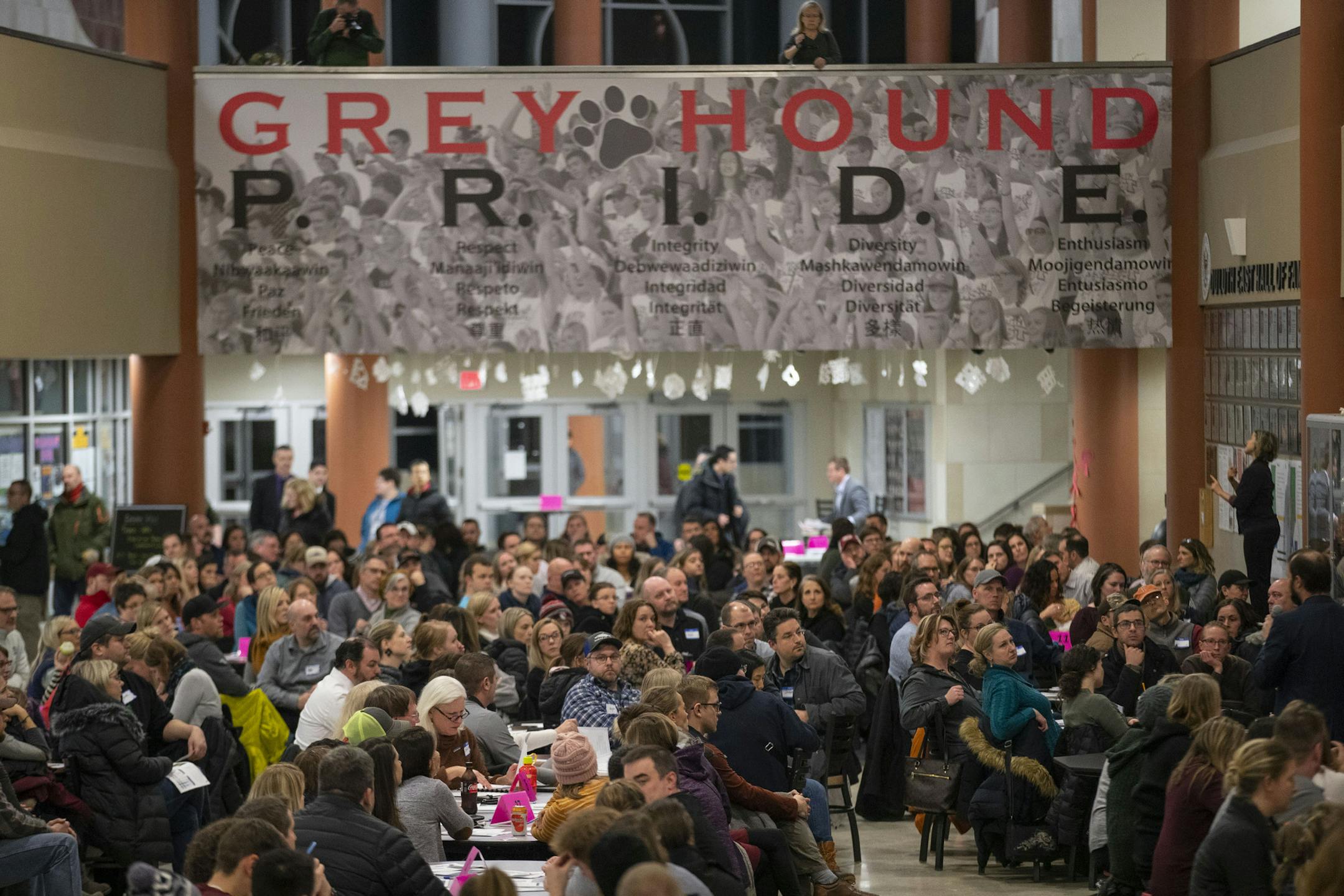 An estimated 400-500 parents and students attended the school boundary meeting at East High School on Wednesday. ]
ALEX KORMANN • alex.kormann@startribune.com An estimated 400-500 parents showed up at East High School on Wednesday January 22, 2020 to listen to a presentation on proposed changes for school boundaries, ask questions and provide feedback. The changes would potentially force students to switch the schools they attend. The meeting went south, however, as frustrated parents fel